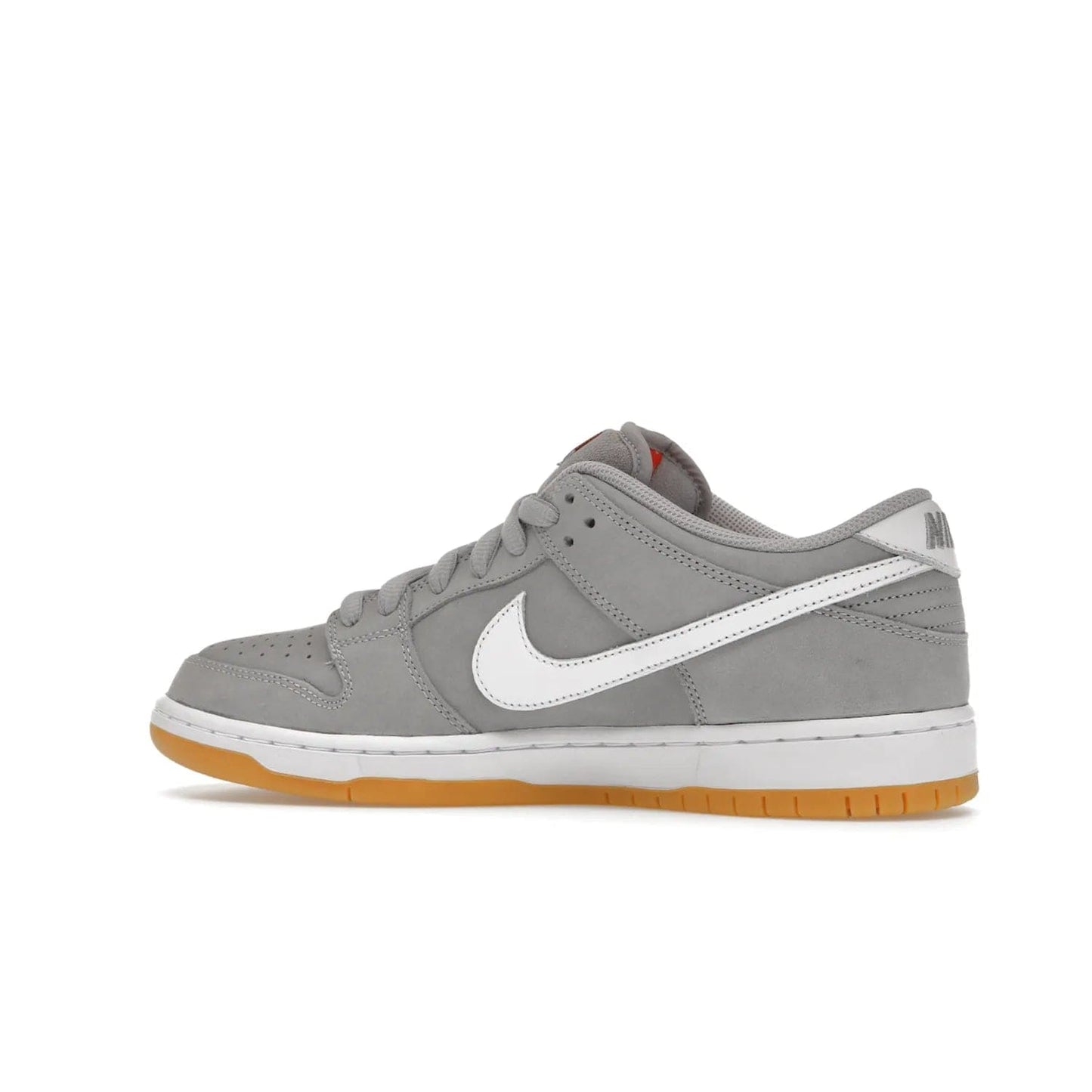 Nike SB Dunk Low Pro ISO Orange Label Wolf Grey Gum - Image 21 - Only at www.BallersClubKickz.com - Introducing Nike's SB Dunk Low Pro ISO Orange Label Wolf Grey Gum - a stylish shoe with a premium Wolf Grey upper, white leather Nike Swoosh, and an eye-catching gum outsole. With special Nike branding and packaging, this shoe adds a unique fashion statement. Out Feb. 24, 2023.