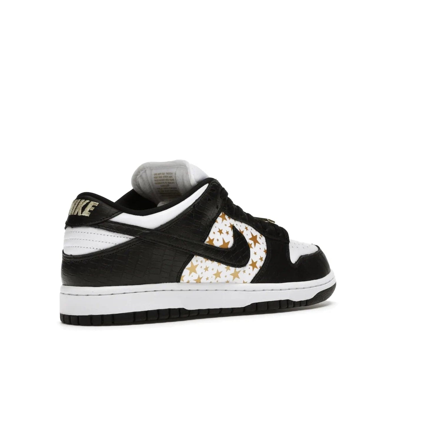 Nike SB Dunk Low Supreme Stars Black (2021) - Image 33 - Only at www.BallersClubKickz.com - Retro style and signature details make the Nike SB Dunk Low Supreme Black a must-have. This special edition shoe features a white leather upper and black croc skin overlays complemented by gold stars and deubré. Enjoy a piece of SB history and grab yours today.