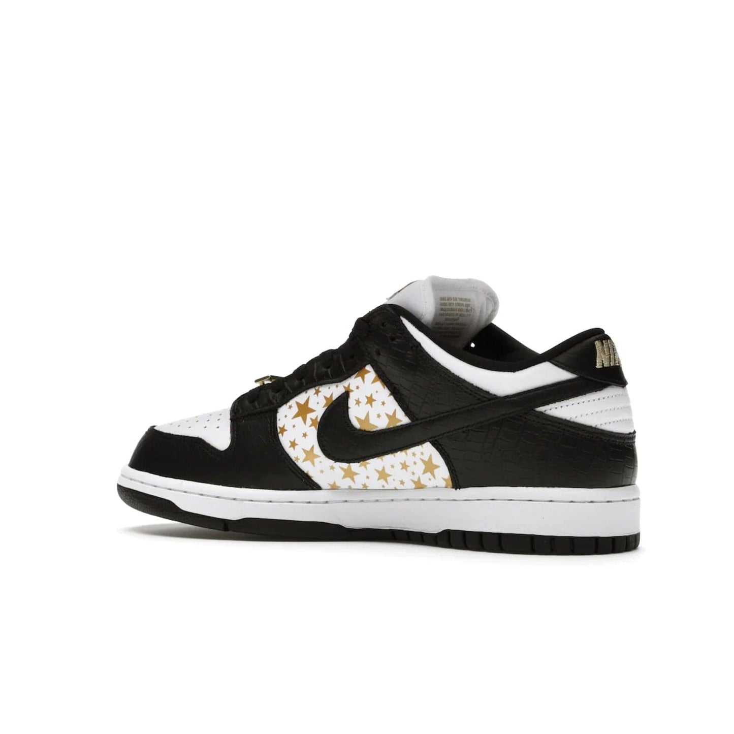 Nike SB Dunk Low Supreme Stars Black (2021) - Image 22 - Only at www.BallersClubKickz.com - Retro style and signature details make the Nike SB Dunk Low Supreme Black a must-have. This special edition shoe features a white leather upper and black croc skin overlays complemented by gold stars and deubré. Enjoy a piece of SB history and grab yours today.