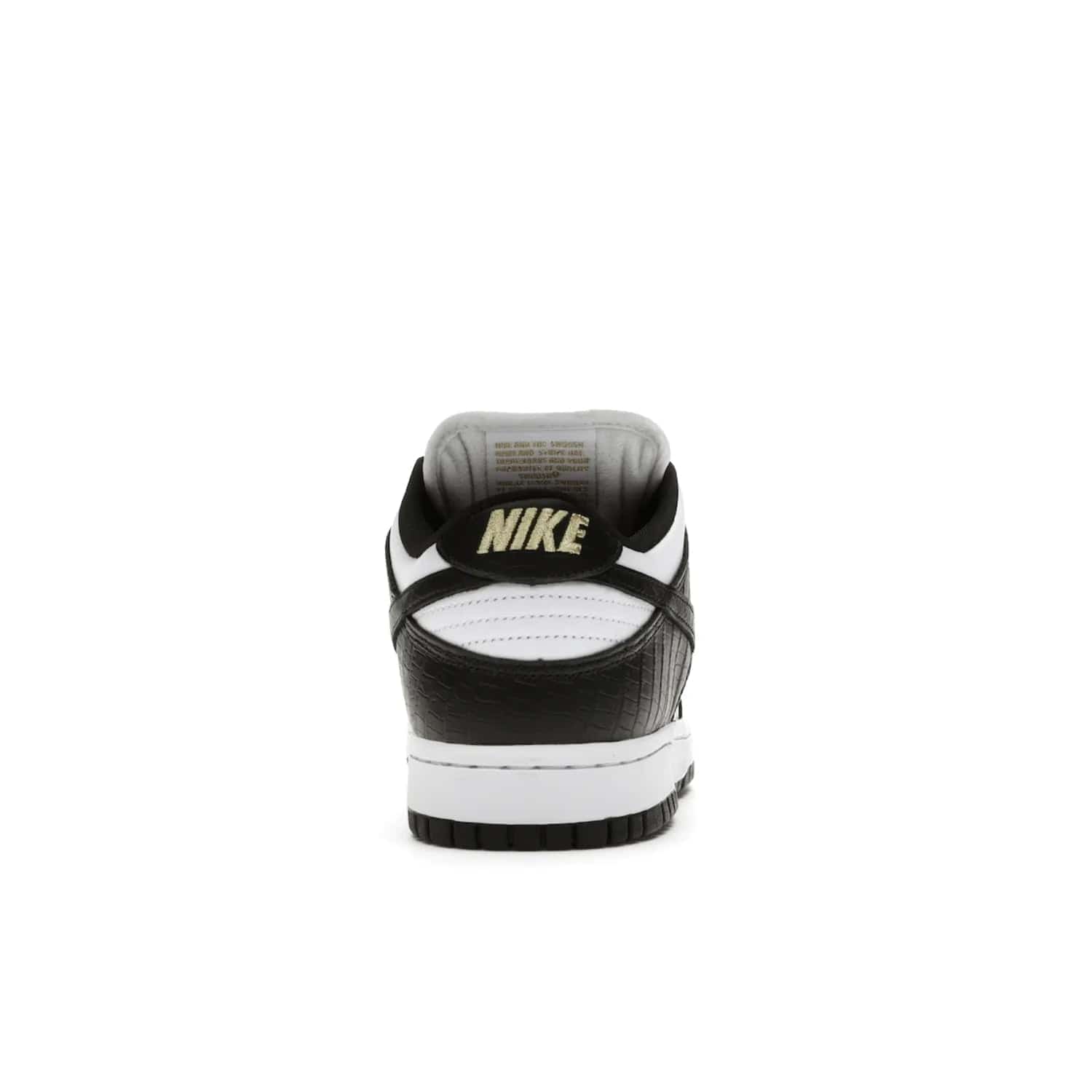 Nike SB Dunk Low Supreme Stars Black (2021) - Image 28 - Only at www.BallersClubKickz.com - Retro style and signature details make the Nike SB Dunk Low Supreme Black a must-have. This special edition shoe features a white leather upper and black croc skin overlays complemented by gold stars and deubré. Enjoy a piece of SB history and grab yours today.