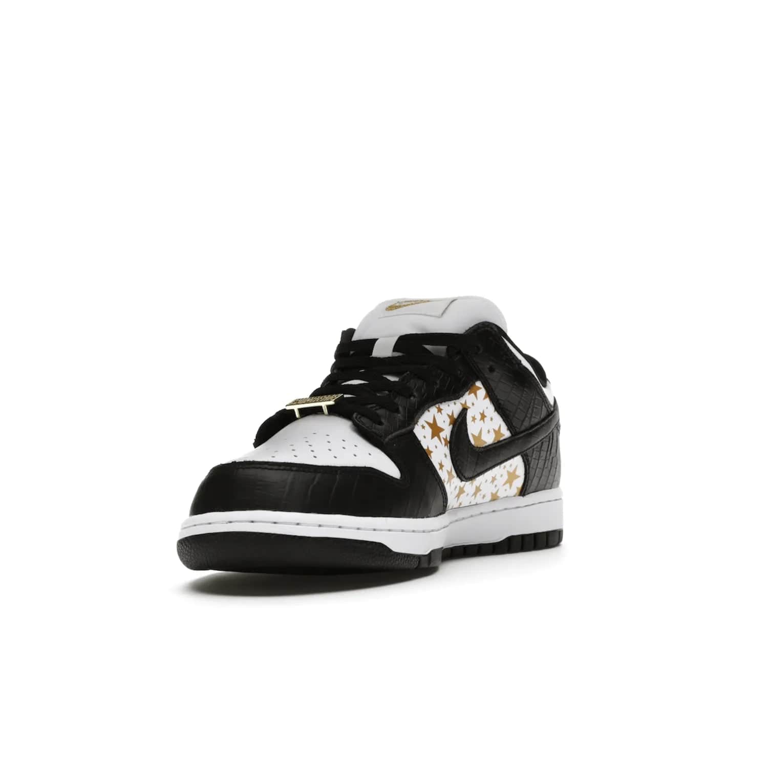 Nike SB Dunk Low Supreme Stars Black (2021) - Image 13 - Only at www.BallersClubKickz.com - Retro style and signature details make the Nike SB Dunk Low Supreme Black a must-have. This special edition shoe features a white leather upper and black croc skin overlays complemented by gold stars and deubré. Enjoy a piece of SB history and grab yours today.