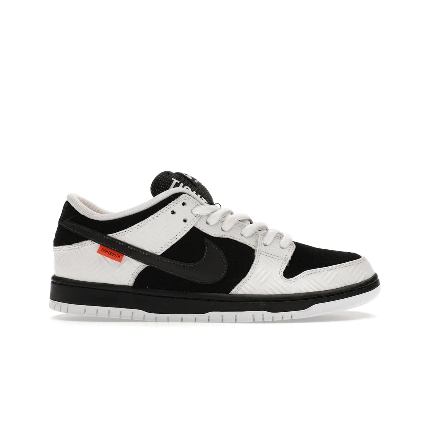 Nike SB Dunk Low TIGHTBOOTH - Image 1 - Only at www.BallersClubKickz.com - Releasing Nov 14, 2023, the TIGHTBOOTH Nike SB Dunk Low celebrates street skating and the urban streets. The White/Black-Safety Orange hue captures the energy and feel of the board and provides superior performance and bold style. Be ready to take on the black of night and make your mark on street culture.