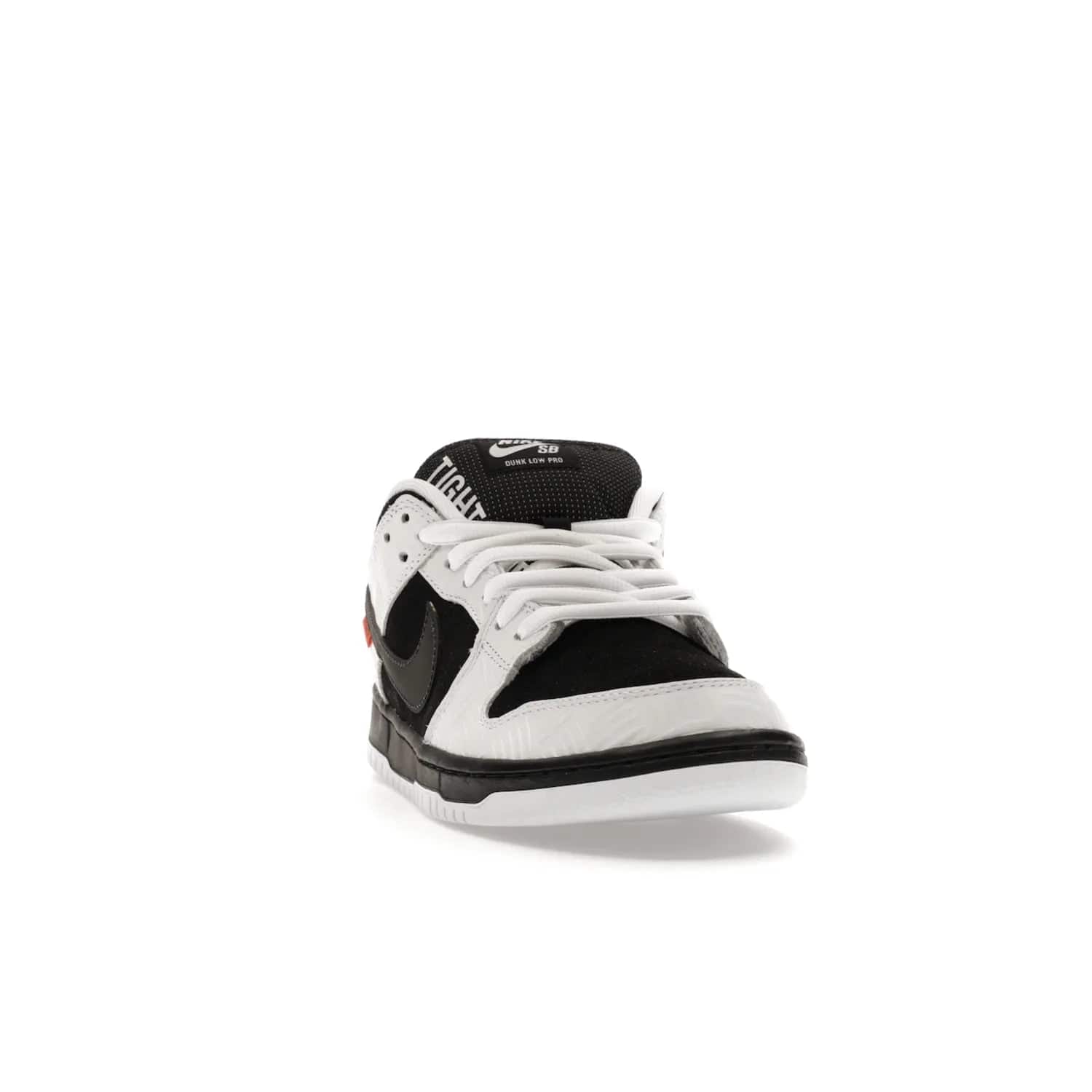Nike SB Dunk Low TIGHTBOOTH - Image 8 - Only at www.BallersClubKickz.com - Releasing Nov 14, 2023, the TIGHTBOOTH Nike SB Dunk Low celebrates street skating and the urban streets. The White/Black-Safety Orange hue captures the energy and feel of the board and provides superior performance and bold style. Be ready to take on the black of night and make your mark on street culture.