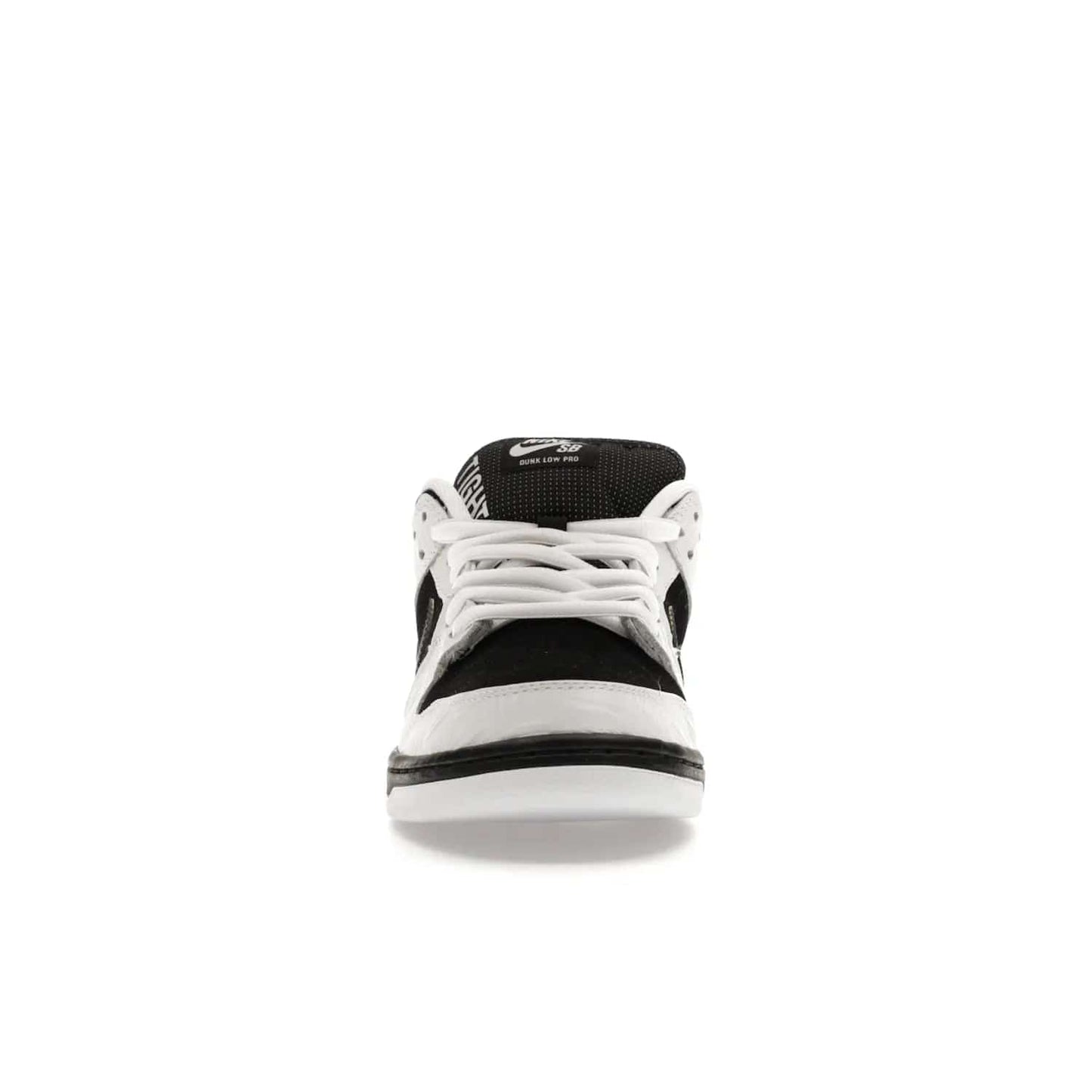 Nike SB Dunk Low TIGHTBOOTH - Image 10 - Only at www.BallersClubKickz.com - Releasing Nov 14, 2023, the TIGHTBOOTH Nike SB Dunk Low celebrates street skating and the urban streets. The White/Black-Safety Orange hue captures the energy and feel of the board and provides superior performance and bold style. Be ready to take on the black of night and make your mark on street culture.