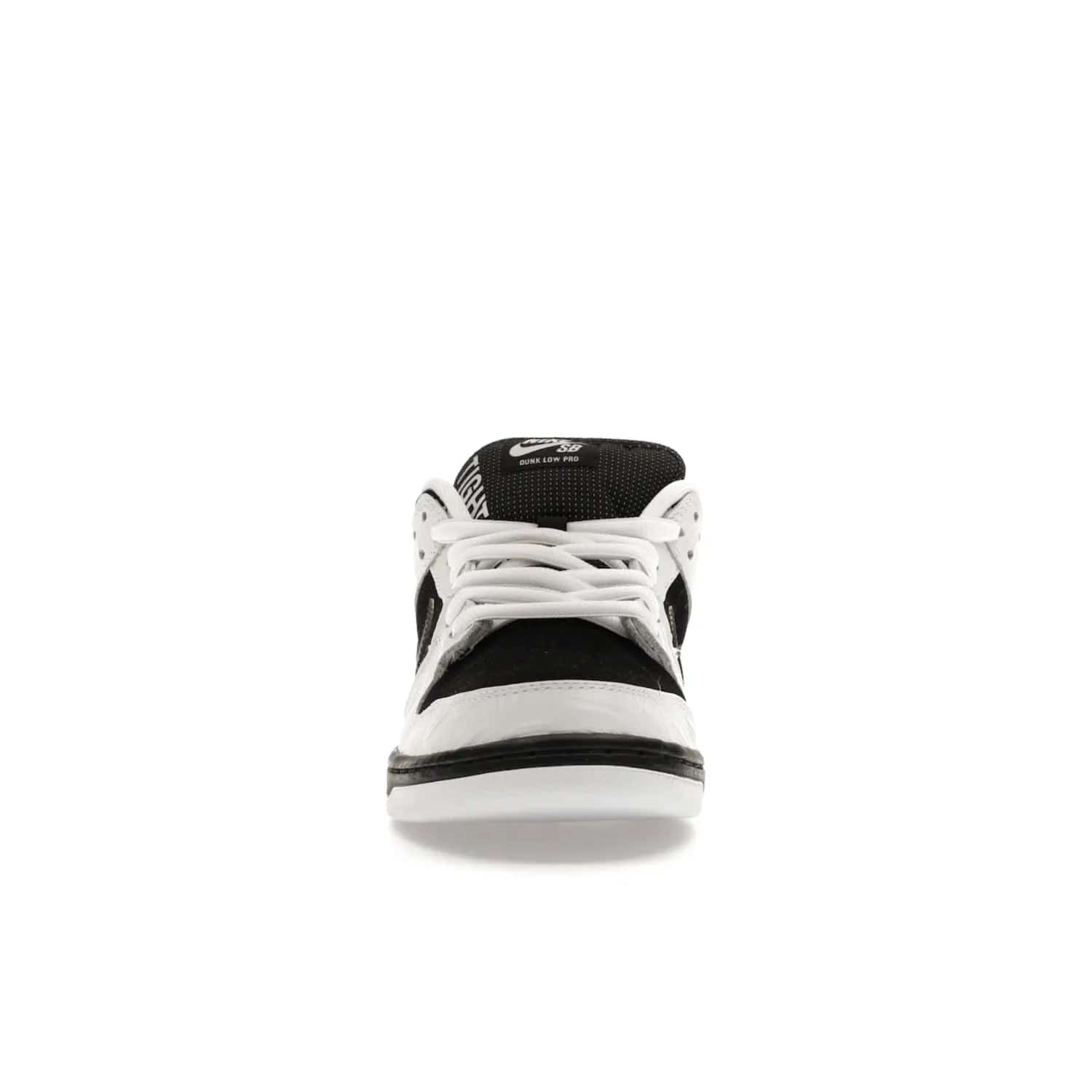 Nike SB Dunk Low TIGHTBOOTH - Image 10 - Only at www.BallersClubKickz.com - Releasing Nov 14, 2023, the TIGHTBOOTH Nike SB Dunk Low celebrates street skating and the urban streets. The White/Black-Safety Orange hue captures the energy and feel of the board and provides superior performance and bold style. Be ready to take on the black of night and make your mark on street culture.
