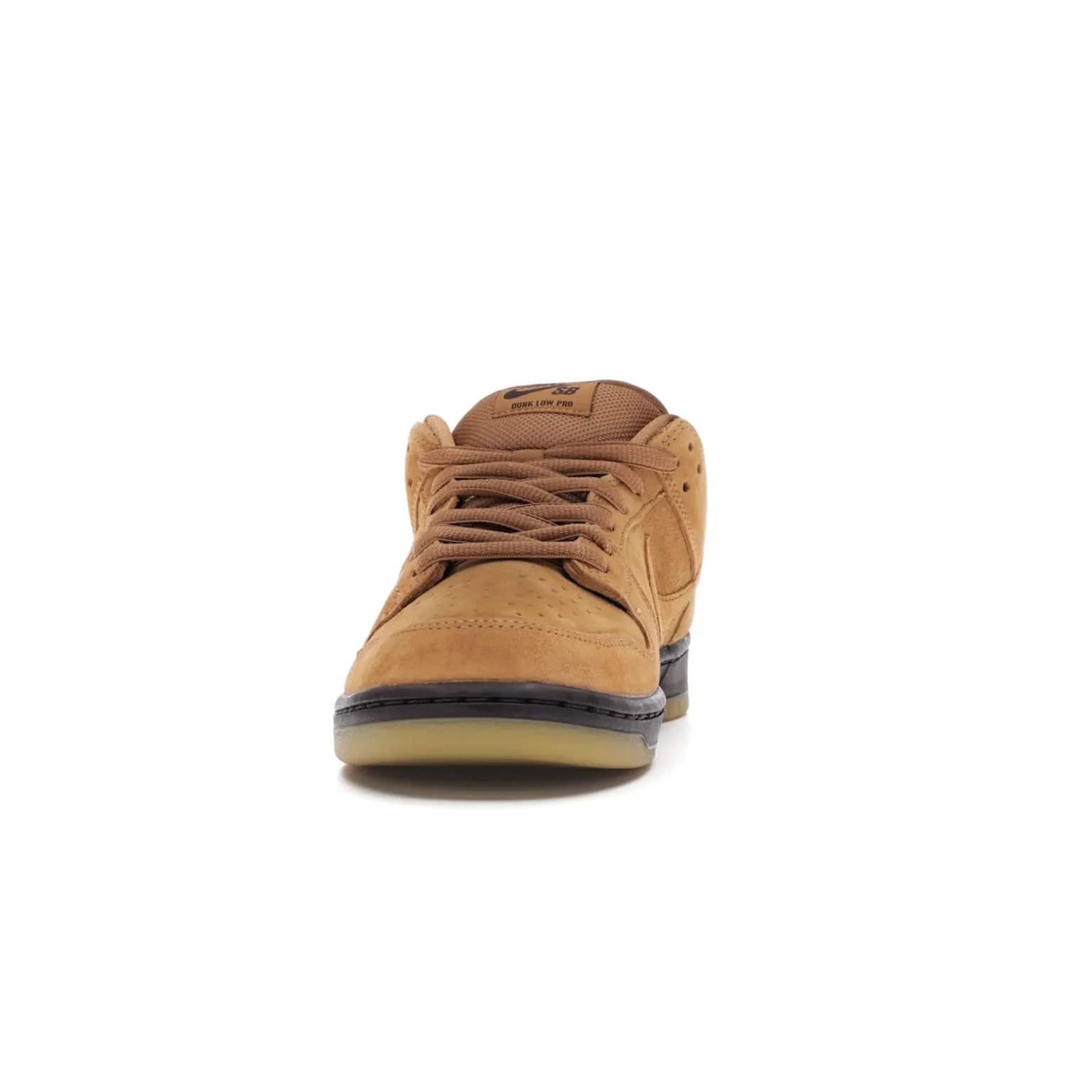 Nike SB Dunk Low Wheat (2021/2023) - Image 11 - Only at www.BallersClubKickz.com - The Nike SB Dunk Low Wheat (2021/2023)has a sleek silhouette and wheat suede upper. Tan tones for lining, mesh tongues, and laces. Iconic color palette midsole, perforated boxing toe. Brown branding on tongue and heel. Gum rubber outsole with partitioned pattern for traction. Eschewed in Feb 2021 for $110.