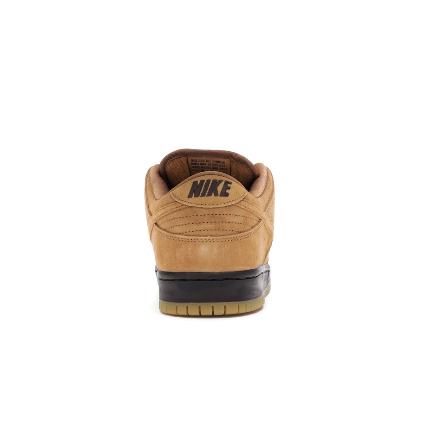Nike SB Dunk Low Wheat (2021/2023) - Image 28 - Only at www.BallersClubKickz.com - The Nike SB Dunk Low Wheat (2021/2023)has a sleek silhouette and wheat suede upper. Tan tones for lining, mesh tongues, and laces. Iconic color palette midsole, perforated boxing toe. Brown branding on tongue and heel. Gum rubber outsole with partitioned pattern for traction. Eschewed in Feb 2021 for $110.