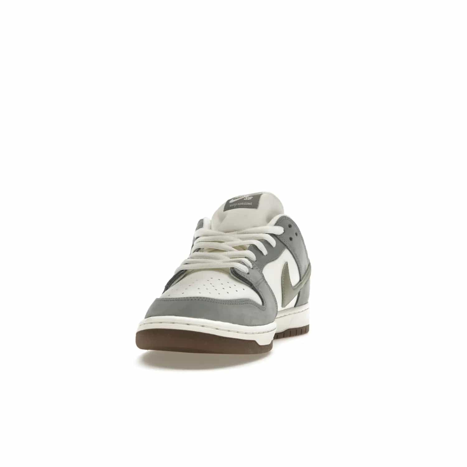 Nike SB Dunk Low Yuto Horigome - Image 12 - Only at www.BallersClubKickz.com - Introducing the Nike SB Dunk Low Yuto Horigome! Co-designed with the skater himself, it features Wolf Grey, Iron Grey, and Sail accents. Comfort and style for everyday wear, plus perfect for skate sessions. Get yours August 29, 2023!