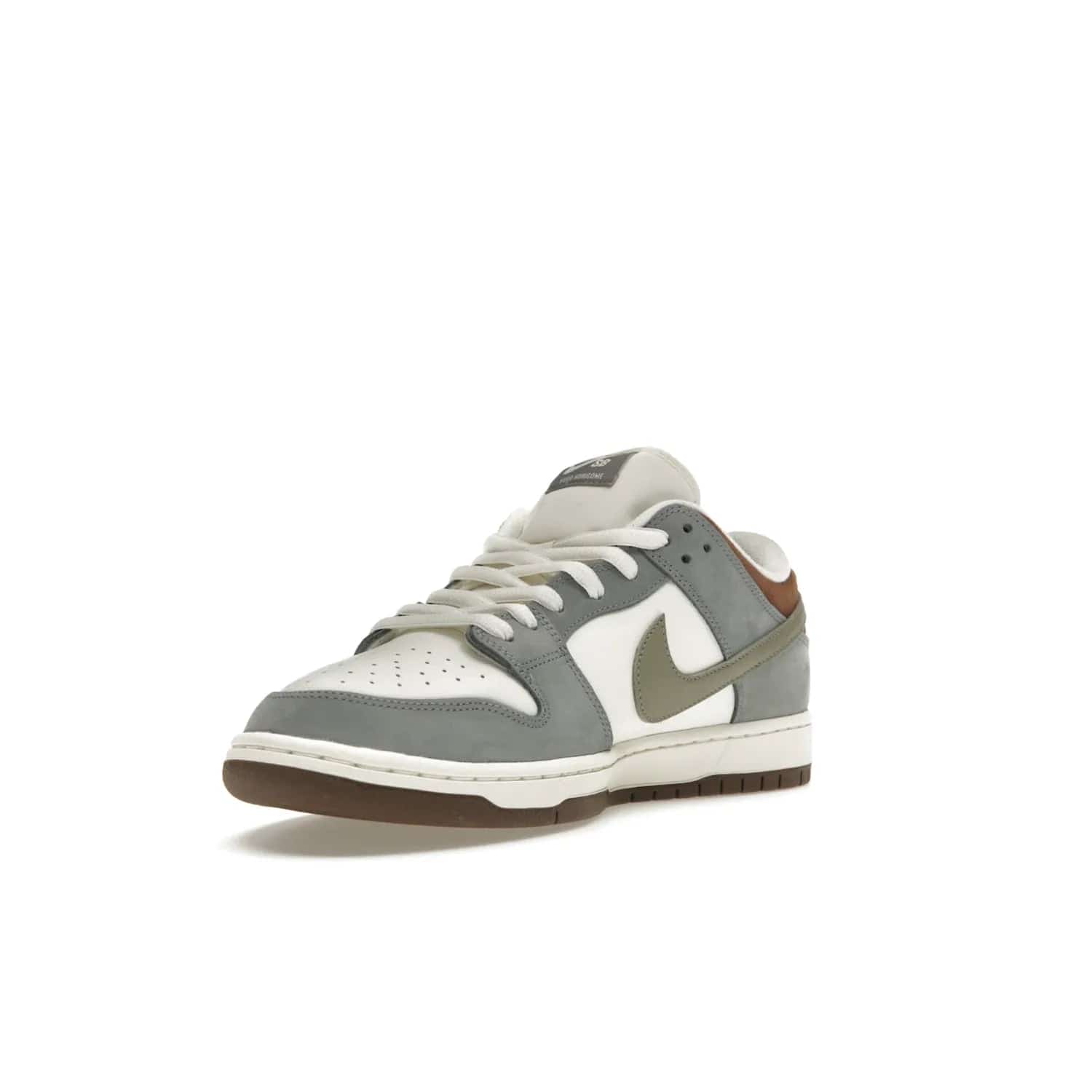 Nike SB Dunk Low Yuto Horigome - Image 14 - Only at www.BallersClubKickz.com - Introducing the Nike SB Dunk Low Yuto Horigome! Co-designed with the skater himself, it features Wolf Grey, Iron Grey, and Sail accents. Comfort and style for everyday wear, plus perfect for skate sessions. Get yours August 29, 2023!