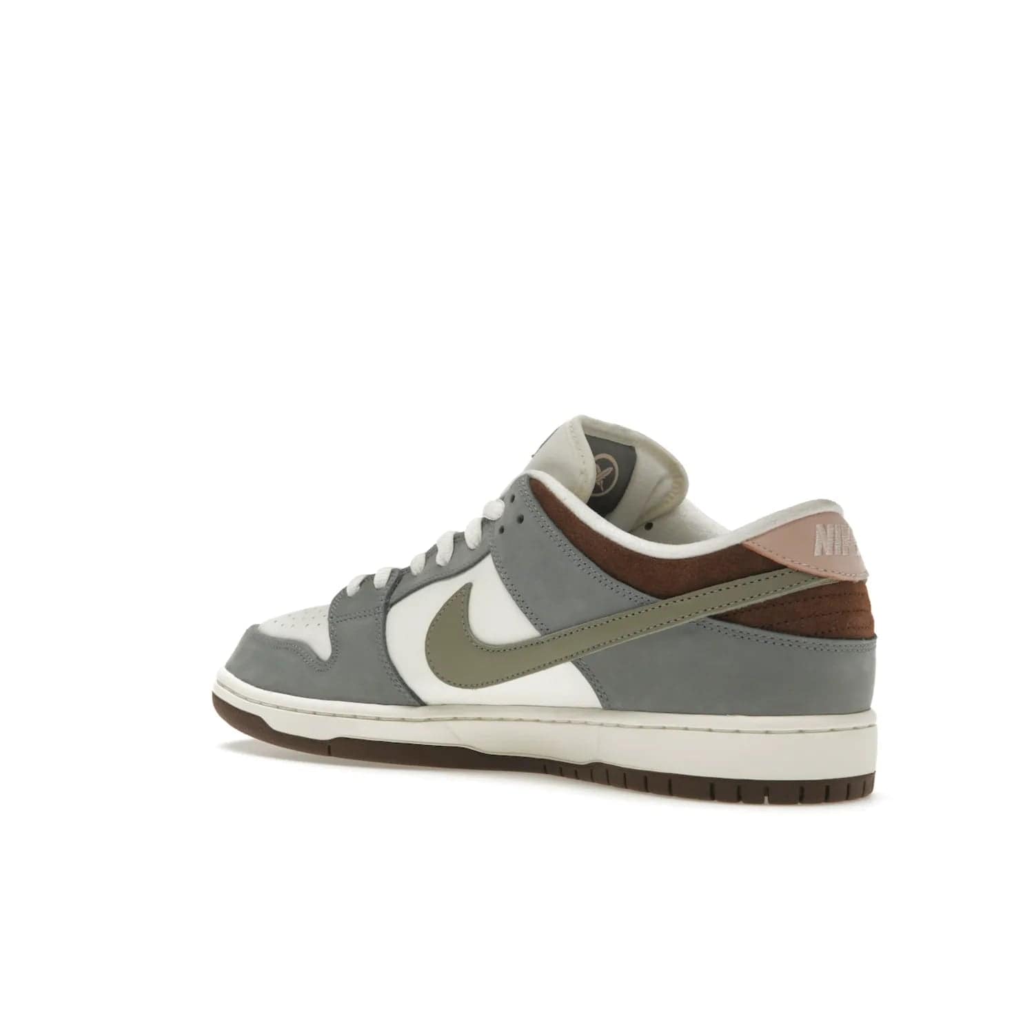 Nike SB Dunk Low Yuto Horigome - Image 23 - Only at www.BallersClubKickz.com - Introducing the Nike SB Dunk Low Yuto Horigome! Co-designed with the skater himself, it features Wolf Grey, Iron Grey, and Sail accents. Comfort and style for everyday wear, plus perfect for skate sessions. Get yours August 29, 2023!