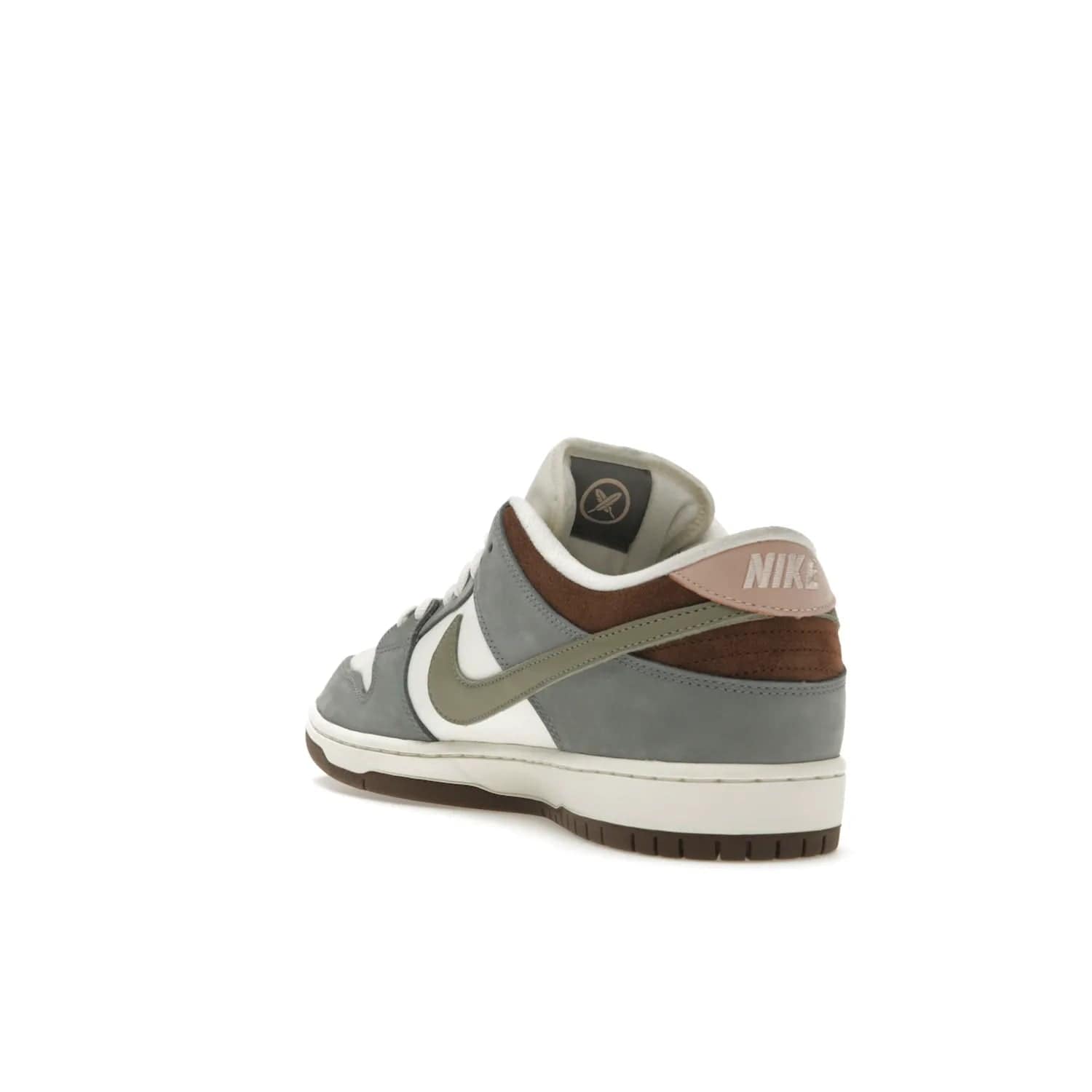 Nike SB Dunk Low Yuto Horigome - Image 25 - Only at www.BallersClubKickz.com - Introducing the Nike SB Dunk Low Yuto Horigome! Co-designed with the skater himself, it features Wolf Grey, Iron Grey, and Sail accents. Comfort and style for everyday wear, plus perfect for skate sessions. Get yours August 29, 2023!