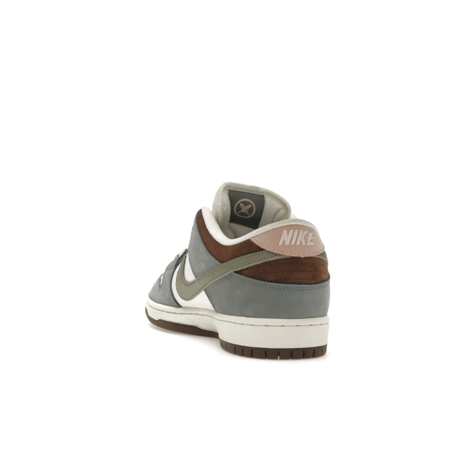 Nike SB Dunk Low Yuto Horigome - Image 26 - Only at www.BallersClubKickz.com - Introducing the Nike SB Dunk Low Yuto Horigome! Co-designed with the skater himself, it features Wolf Grey, Iron Grey, and Sail accents. Comfort and style for everyday wear, plus perfect for skate sessions. Get yours August 29, 2023!