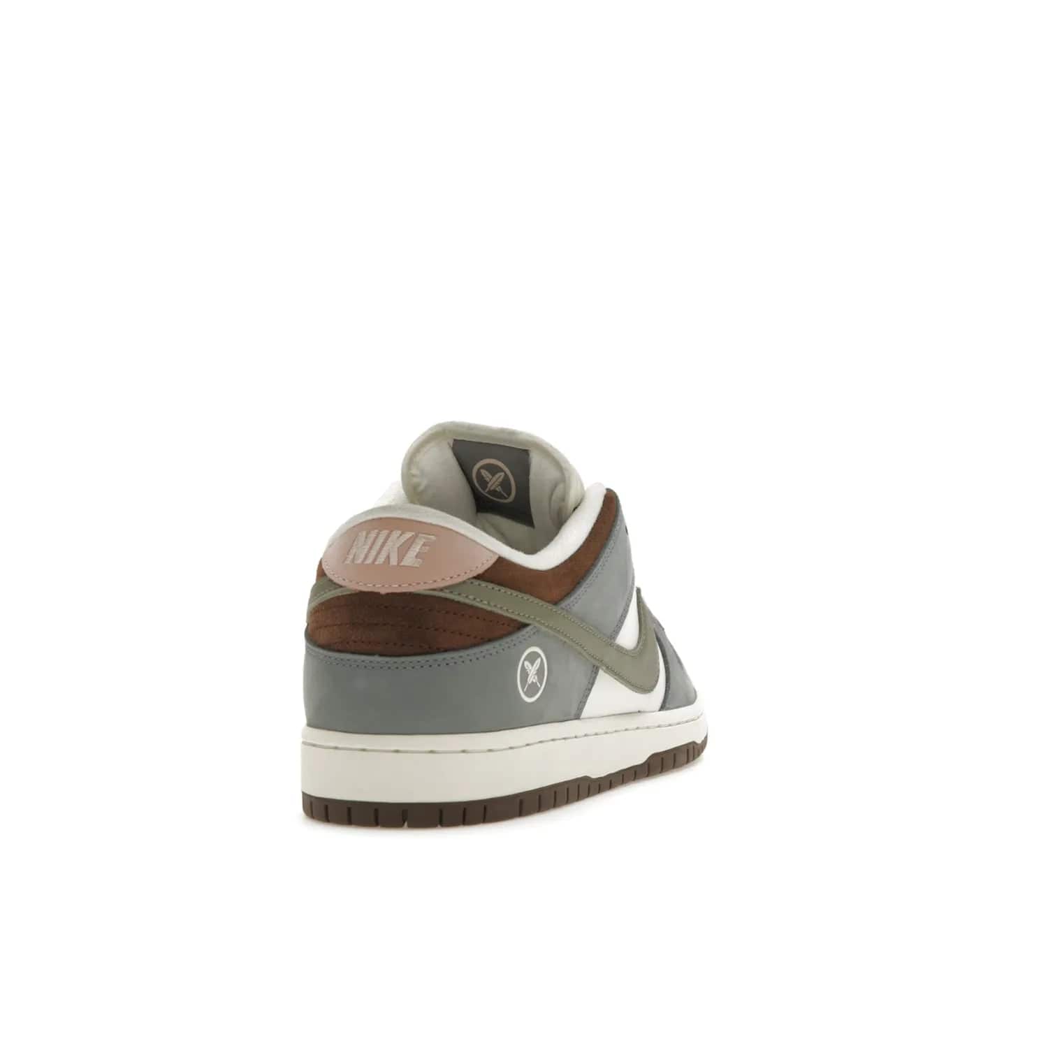Nike SB Dunk Low Yuto Horigome - Image 30 - Only at www.BallersClubKickz.com - Introducing the Nike SB Dunk Low Yuto Horigome! Co-designed with the skater himself, it features Wolf Grey, Iron Grey, and Sail accents. Comfort and style for everyday wear, plus perfect for skate sessions. Get yours August 29, 2023!