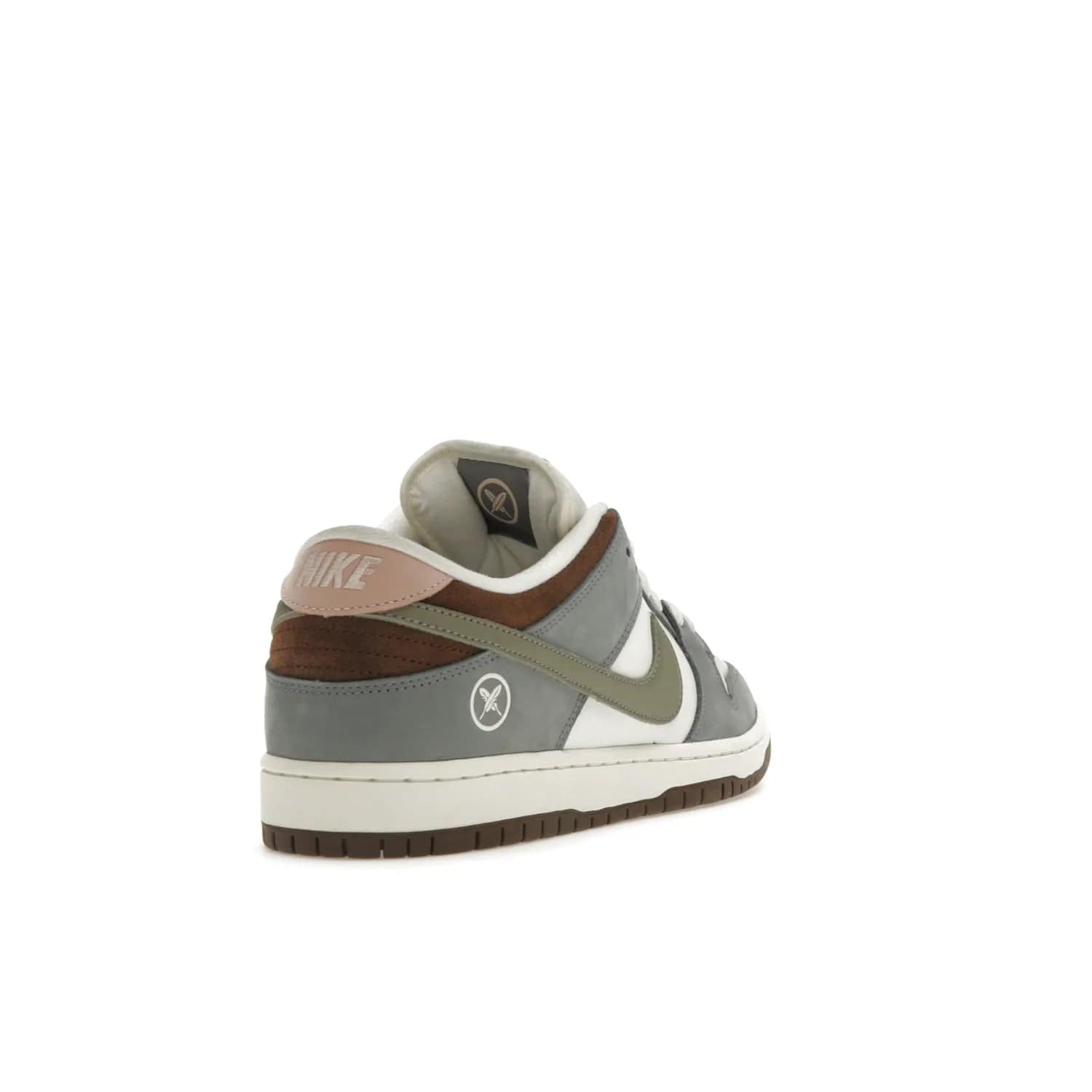 Nike SB Dunk Low Yuto Horigome - Image 31 - Only at www.BallersClubKickz.com - Introducing the Nike SB Dunk Low Yuto Horigome! Co-designed with the skater himself, it features Wolf Grey, Iron Grey, and Sail accents. Comfort and style for everyday wear, plus perfect for skate sessions. Get yours August 29, 2023!