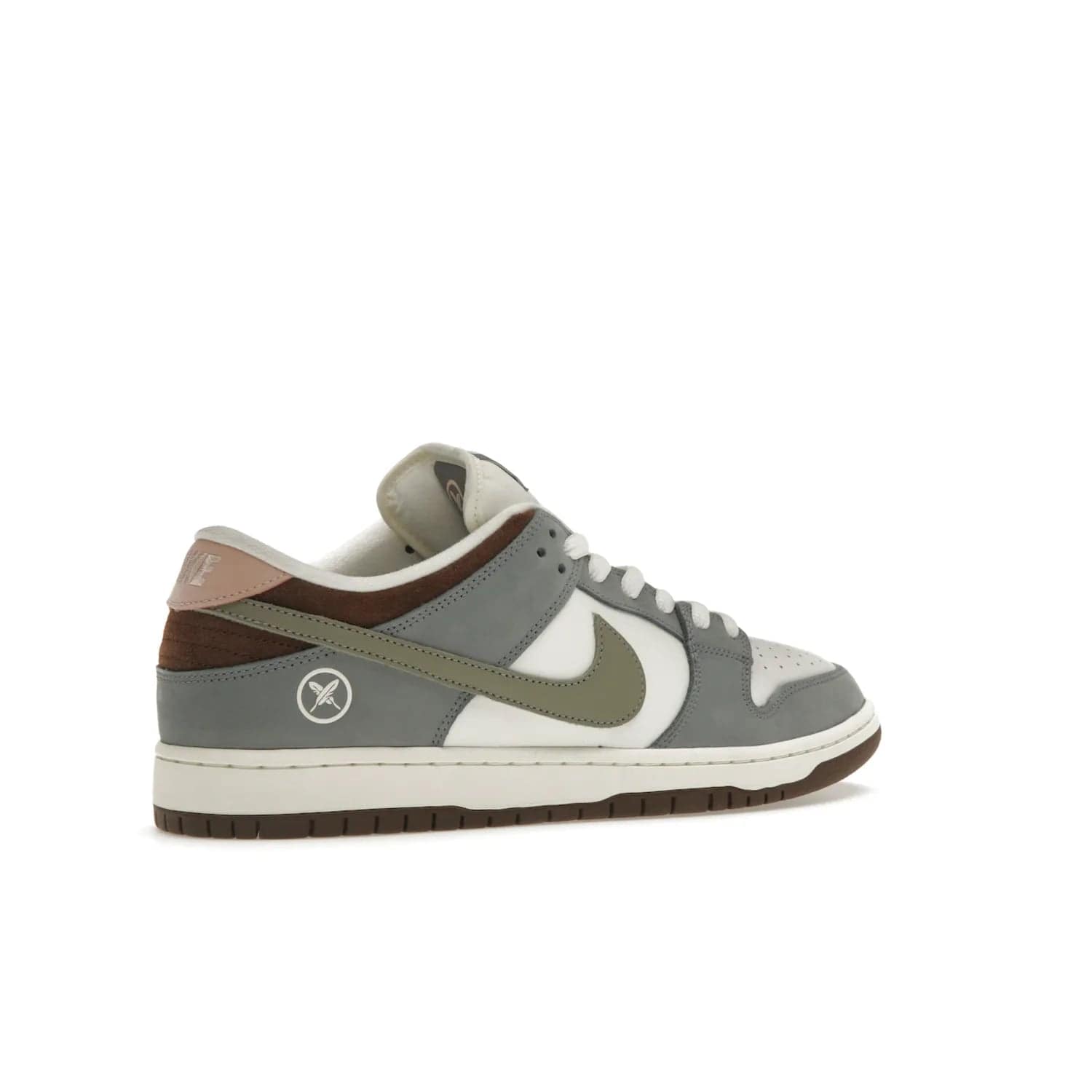 Nike SB Dunk Low Yuto Horigome - Image 34 - Only at www.BallersClubKickz.com - Introducing the Nike SB Dunk Low Yuto Horigome! Co-designed with the skater himself, it features Wolf Grey, Iron Grey, and Sail accents. Comfort and style for everyday wear, plus perfect for skate sessions. Get yours August 29, 2023!
