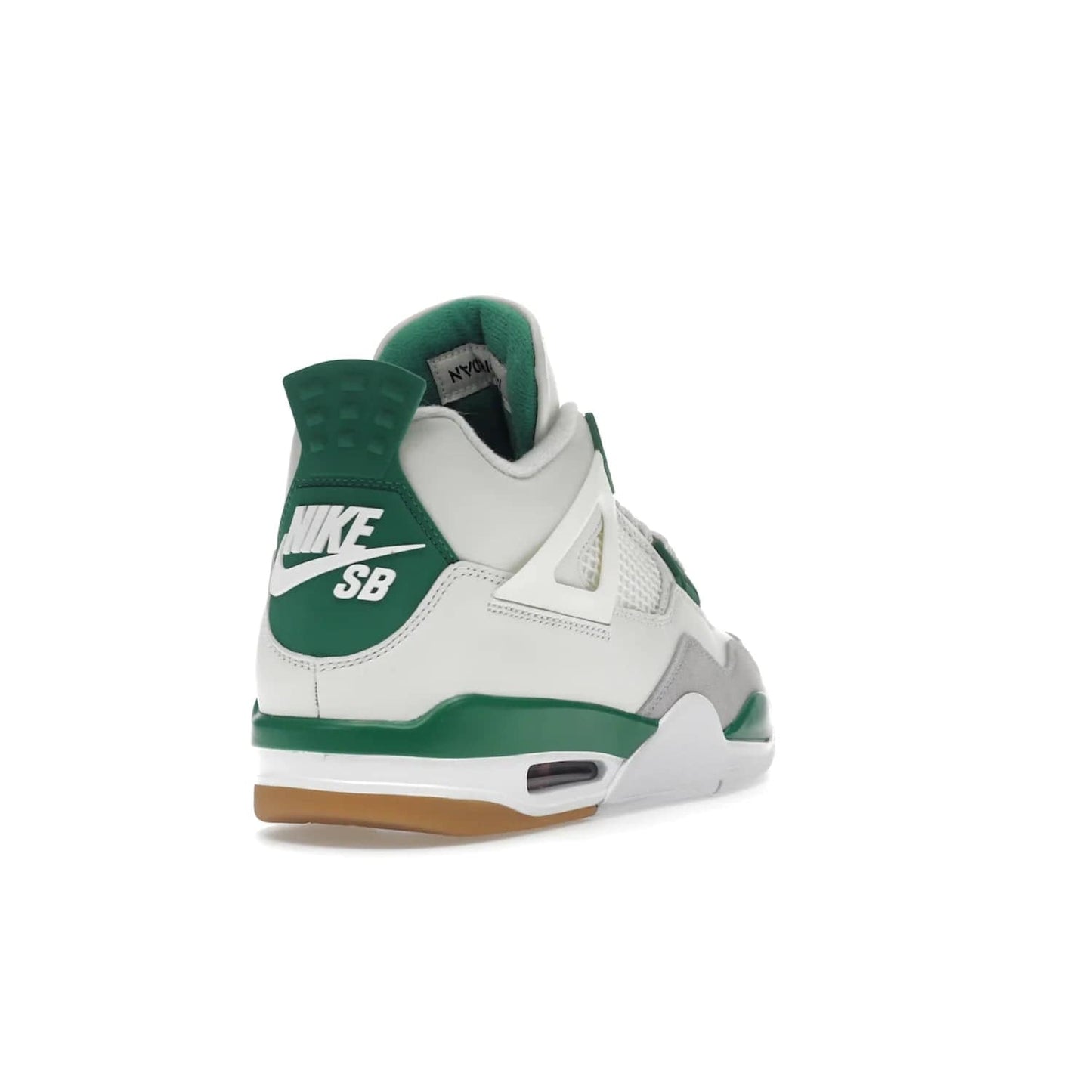 Jordan 4 Retro SB Pine Green - Image 31 - Only at www.BallersClubKickz.com - A white leather upper combined with a Neutral Grey suede mudguard gives this limited Air Jordan 4 Retro SB Pine Green sneaker its unmistakable style. Released March 20, 2023, the Jordan 4 Retro SB features a white and Pine Green midsole plus a red air unit with a gum outsole for grip. The perfect blend of Nike SB skateboarding and Jordan 4 classic design.