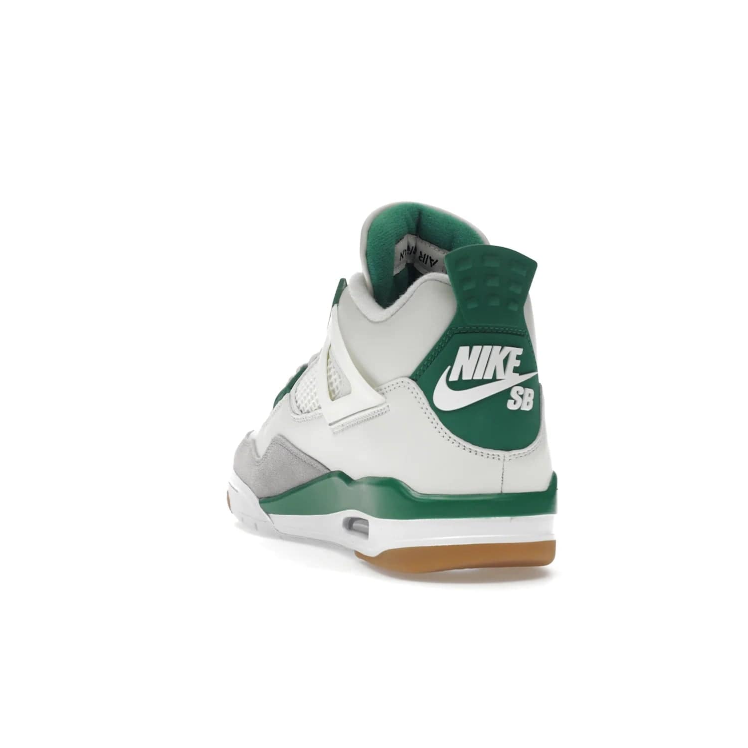 Jordan 4 Retro SB Pine Green - Image 26 - Only at www.BallersClubKickz.com - A white leather upper combined with a Neutral Grey suede mudguard gives this limited Air Jordan 4 Retro SB Pine Green sneaker its unmistakable style. Released March 20, 2023, the Jordan 4 Retro SB features a white and Pine Green midsole plus a red air unit with a gum outsole for grip. The perfect blend of Nike SB skateboarding and Jordan 4 classic design.