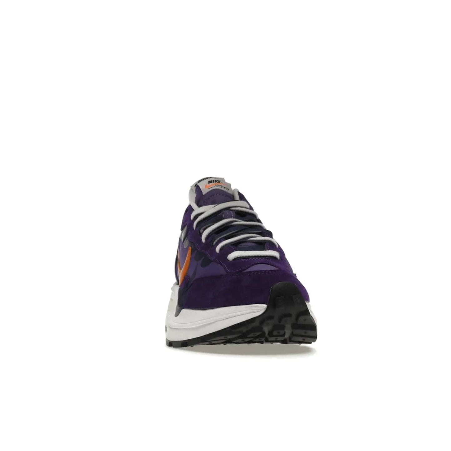Nike Vaporwaffle sacai Dark Iris - Image 9 - Only at www.BallersClubKickz.com - Unique Nike Vaporwaffle sacai Dark Iris collab. Suede, leather & textile upper with Orange accents. Dual tongues & midsoles. Woven labels & heel tabs branding. Colorway of Purple, Orange, White & Black. Must-have for any wardrobe.