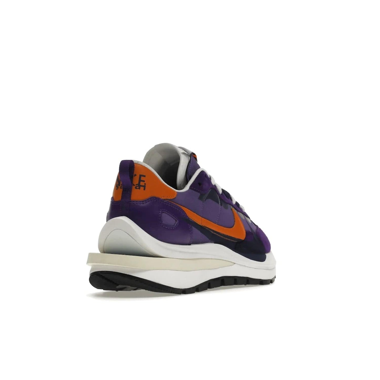 Nike Vaporwaffle sacai Dark Iris - Image 31 - Only at www.BallersClubKickz.com - Unique Nike Vaporwaffle sacai Dark Iris collab. Suede, leather & textile upper with Orange accents. Dual tongues & midsoles. Woven labels & heel tabs branding. Colorway of Purple, Orange, White & Black. Must-have for any wardrobe.