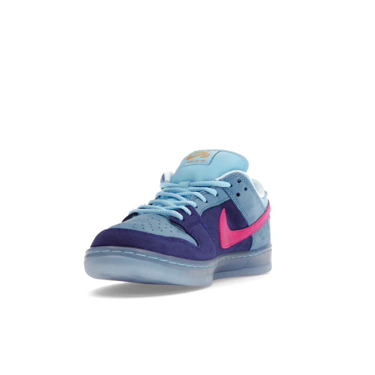 Nike SB Dunk Low Run The Jewels - Image 13 - Only at www.BallersClubKickz.com - The Nike SB Dunk Low Run The Jewels pays tribute to the Run the Jewels 3 album cover. It features a blue suede upper with pink suede accents, gold branding and 3 lace sets. RTJ insoles complete this limited edition sneaker. Get it now for your shoe collection.