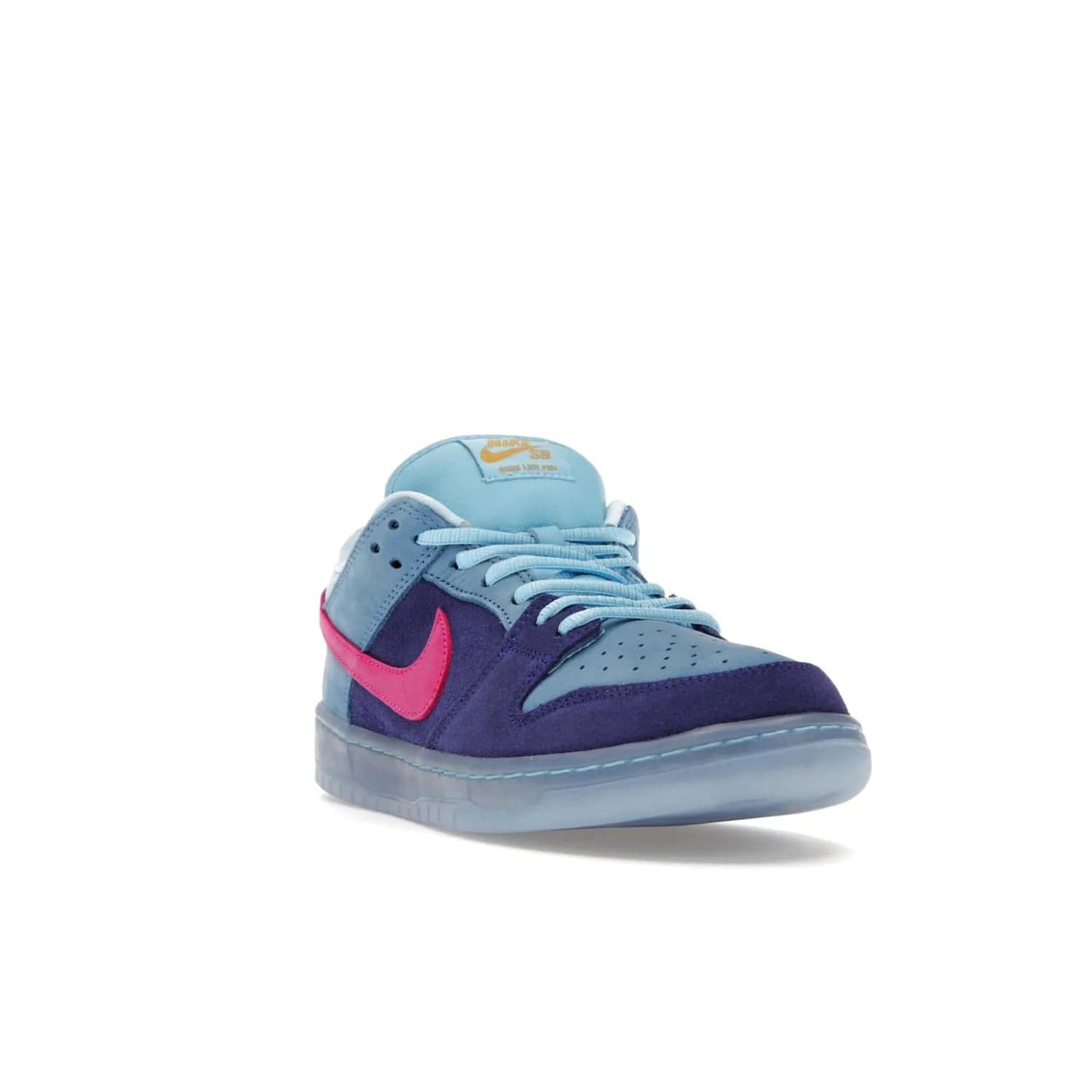 Nike SB Dunk Low Run The Jewels - Image 7 - Only at www.BallersClubKickz.com - The Nike SB Dunk Low Run The Jewels pays tribute to the Run the Jewels 3 album cover. It features a blue suede upper with pink suede accents, gold branding and 3 lace sets. RTJ insoles complete this limited edition sneaker. Get it now for your shoe collection.