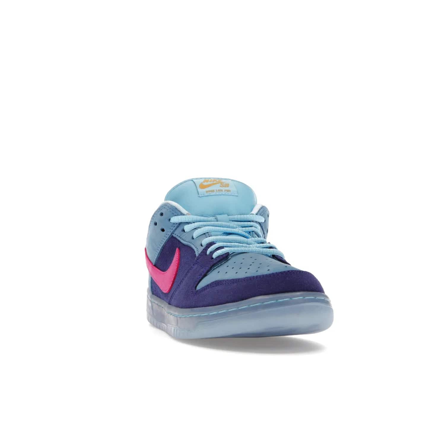 Nike SB Dunk Low Run The Jewels - Image 8 - Only at www.BallersClubKickz.com - The Nike SB Dunk Low Run The Jewels pays tribute to the Run the Jewels 3 album cover. It features a blue suede upper with pink suede accents, gold branding and 3 lace sets. RTJ insoles complete this limited edition sneaker. Get it now for your shoe collection.