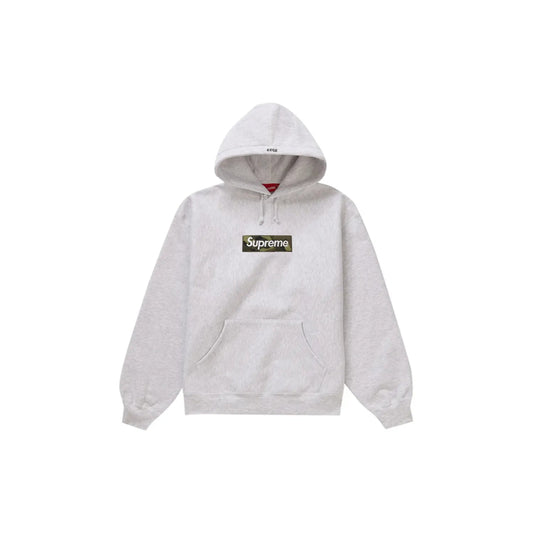 Supreme Box Logo Hooded Sweatshirt (FW23) Ash Grey - Image 1 - Only at www.BallersClubKickz.com - Update your wardrobe with this Supreme Box Logo Hooded Sweatshirt Ash Grey for FW2023 Week 16, featuring the iconic NIGO-modeled colorway, heavyweight crossgrain, brushed-back fleece, embroidered 2023, rib gussets, and pouch pocket.