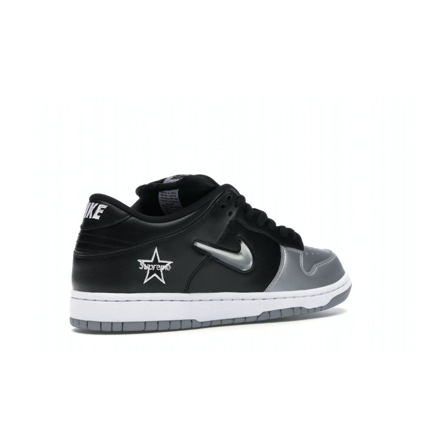 Nike SB Dunk Low Supreme Jewel Swoosh Silver - Image 33 - Only at www.BallersClubKickz.com - This Metallic Silver/Metallic Silver-Black Nike SB Dunk Low Supreme Jewel Swoosh Silver brings a flashy design to the iconic SB Dunk. Released in 2019, this is a must-have for any collection.