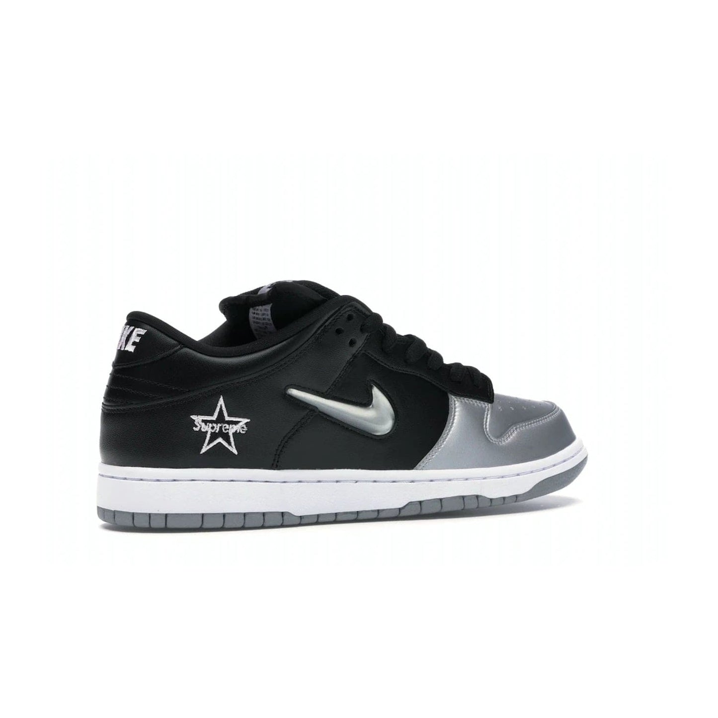 Nike SB Dunk Low Supreme Jewel Swoosh Silver - Image 34 - Only at www.BallersClubKickz.com - This Metallic Silver/Metallic Silver-Black Nike SB Dunk Low Supreme Jewel Swoosh Silver brings a flashy design to the iconic SB Dunk. Released in 2019, this is a must-have for any collection.