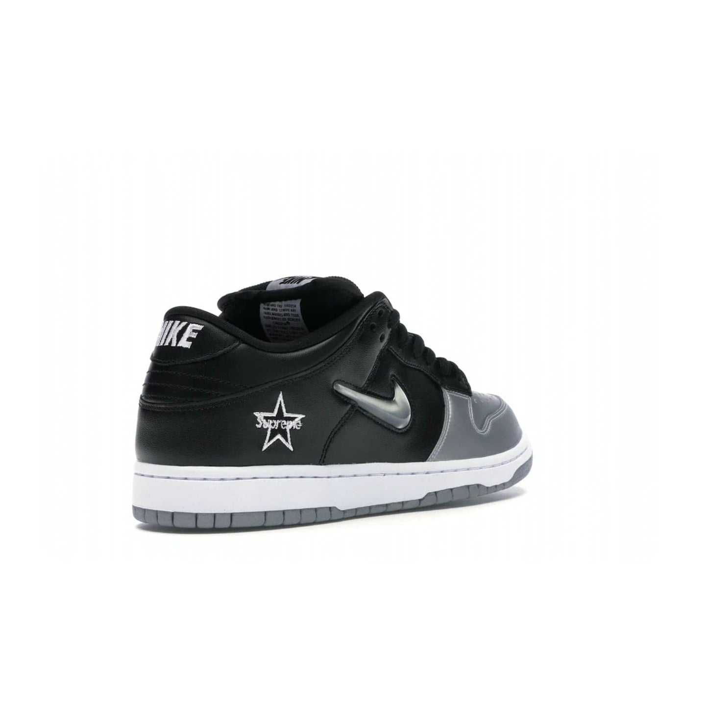 Nike SB Dunk Low Supreme Jewel Swoosh Silver - Image 32 - Only at www.BallersClubKickz.com - This Metallic Silver/Metallic Silver-Black Nike SB Dunk Low Supreme Jewel Swoosh Silver brings a flashy design to the iconic SB Dunk. Released in 2019, this is a must-have for any collection.