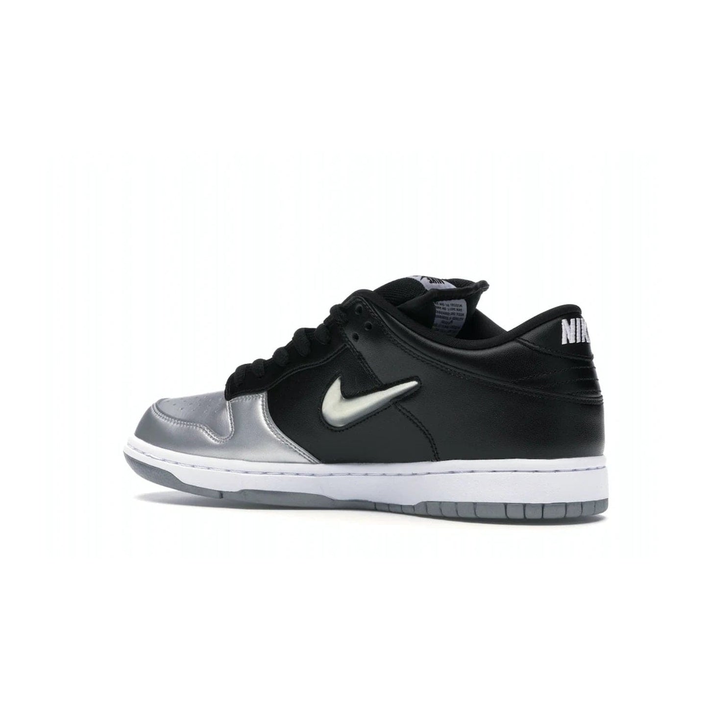 Nike SB Dunk Low Supreme Jewel Swoosh Silver - Image 22 - Only at www.BallersClubKickz.com - This Metallic Silver/Metallic Silver-Black Nike SB Dunk Low Supreme Jewel Swoosh Silver brings a flashy design to the iconic SB Dunk. Released in 2019, this is a must-have for any collection.