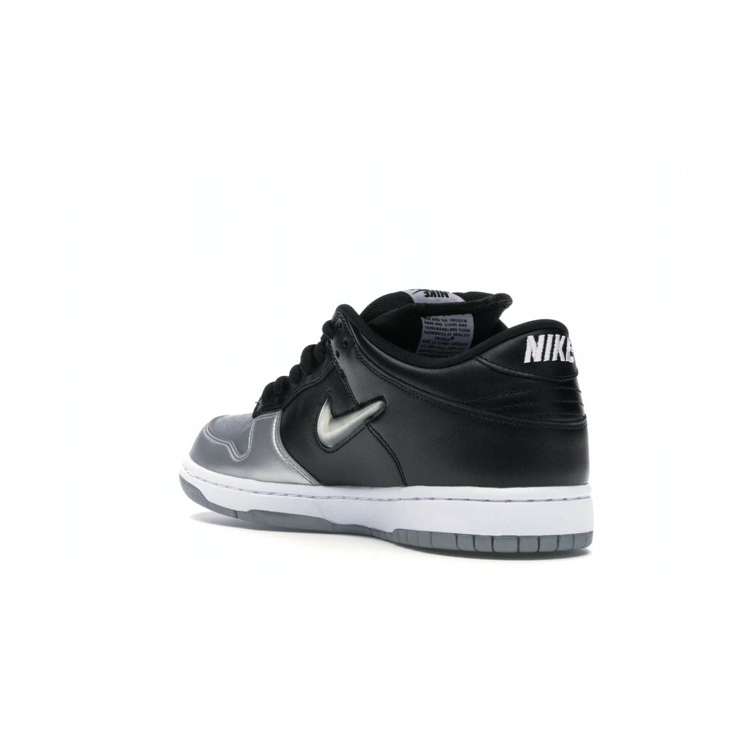 Nike SB Dunk Low Supreme Jewel Swoosh Silver - Image 24 - Only at www.BallersClubKickz.com - This Metallic Silver/Metallic Silver-Black Nike SB Dunk Low Supreme Jewel Swoosh Silver brings a flashy design to the iconic SB Dunk. Released in 2019, this is a must-have for any collection.