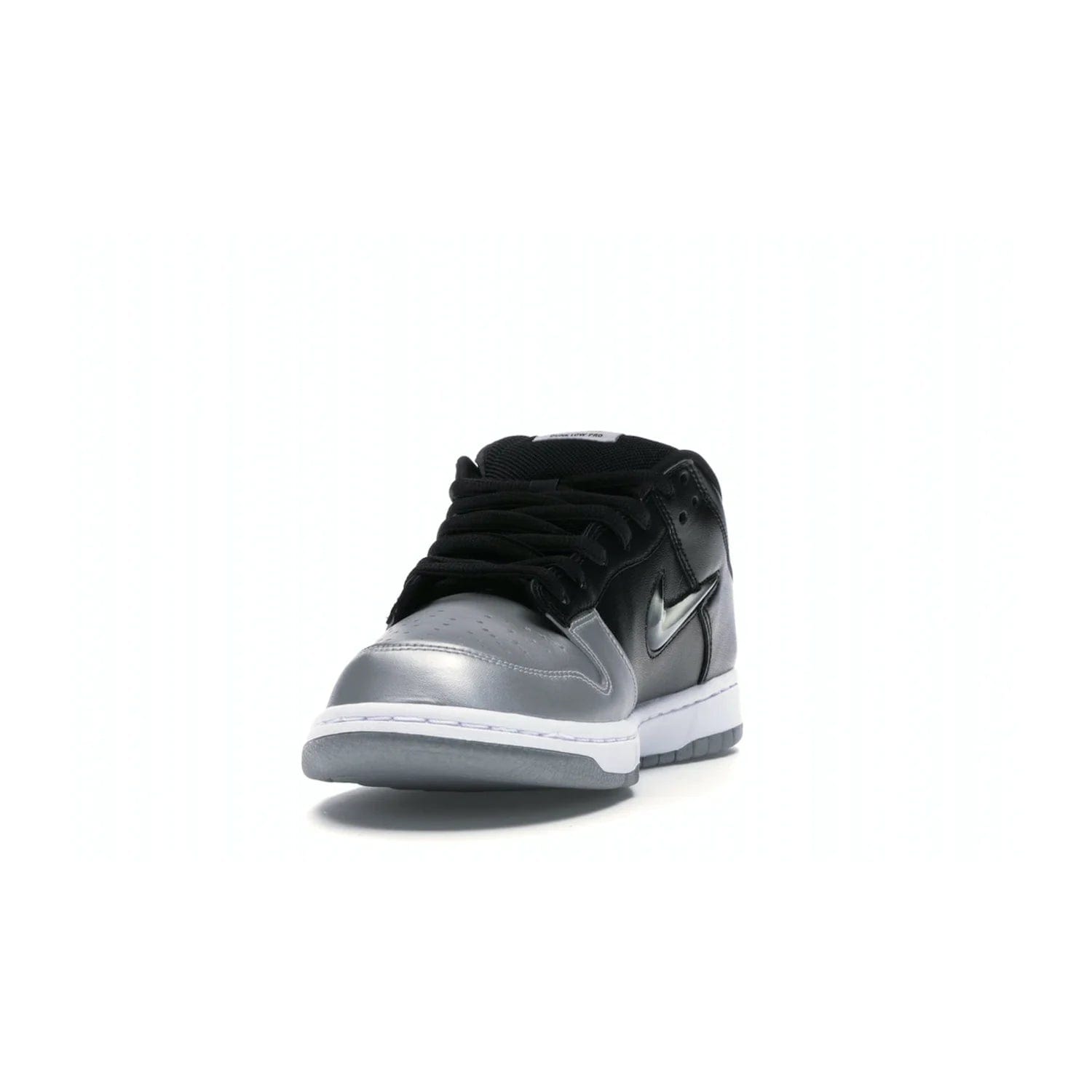 Nike SB Dunk Low Supreme Jewel Swoosh Silver - Image 12 - Only at www.BallersClubKickz.com - This Metallic Silver/Metallic Silver-Black Nike SB Dunk Low Supreme Jewel Swoosh Silver brings a flashy design to the iconic SB Dunk. Released in 2019, this is a must-have for any collection.