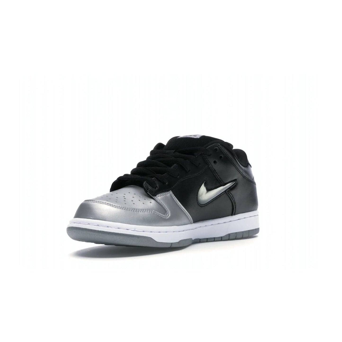 Nike SB Dunk Low Supreme Jewel Swoosh Silver - Image 14 - Only at www.BallersClubKickz.com - This Metallic Silver/Metallic Silver-Black Nike SB Dunk Low Supreme Jewel Swoosh Silver brings a flashy design to the iconic SB Dunk. Released in 2019, this is a must-have for any collection.
