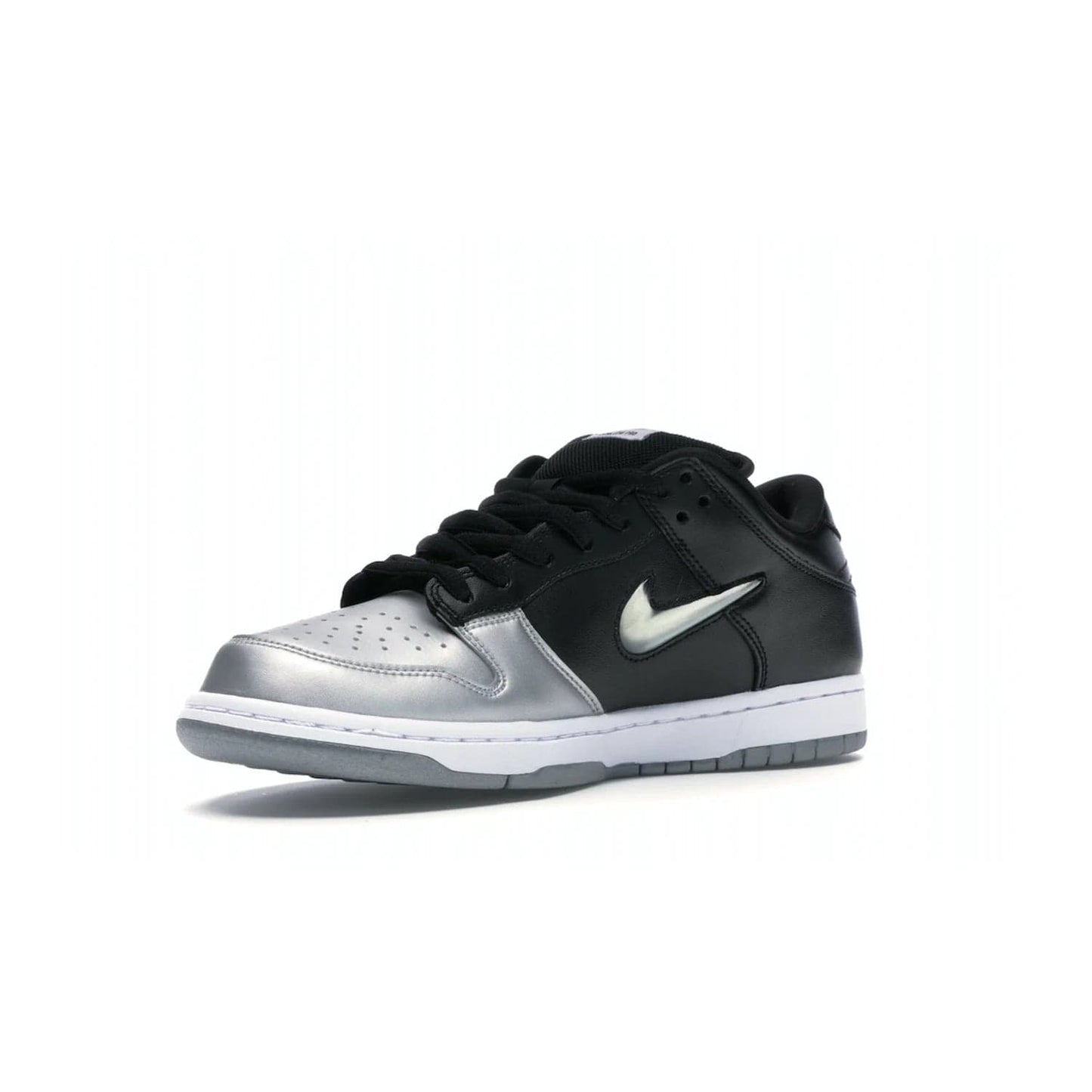 Nike SB Dunk Low Supreme Jewel Swoosh Silver - Image 15 - Only at www.BallersClubKickz.com - This Metallic Silver/Metallic Silver-Black Nike SB Dunk Low Supreme Jewel Swoosh Silver brings a flashy design to the iconic SB Dunk. Released in 2019, this is a must-have for any collection.
