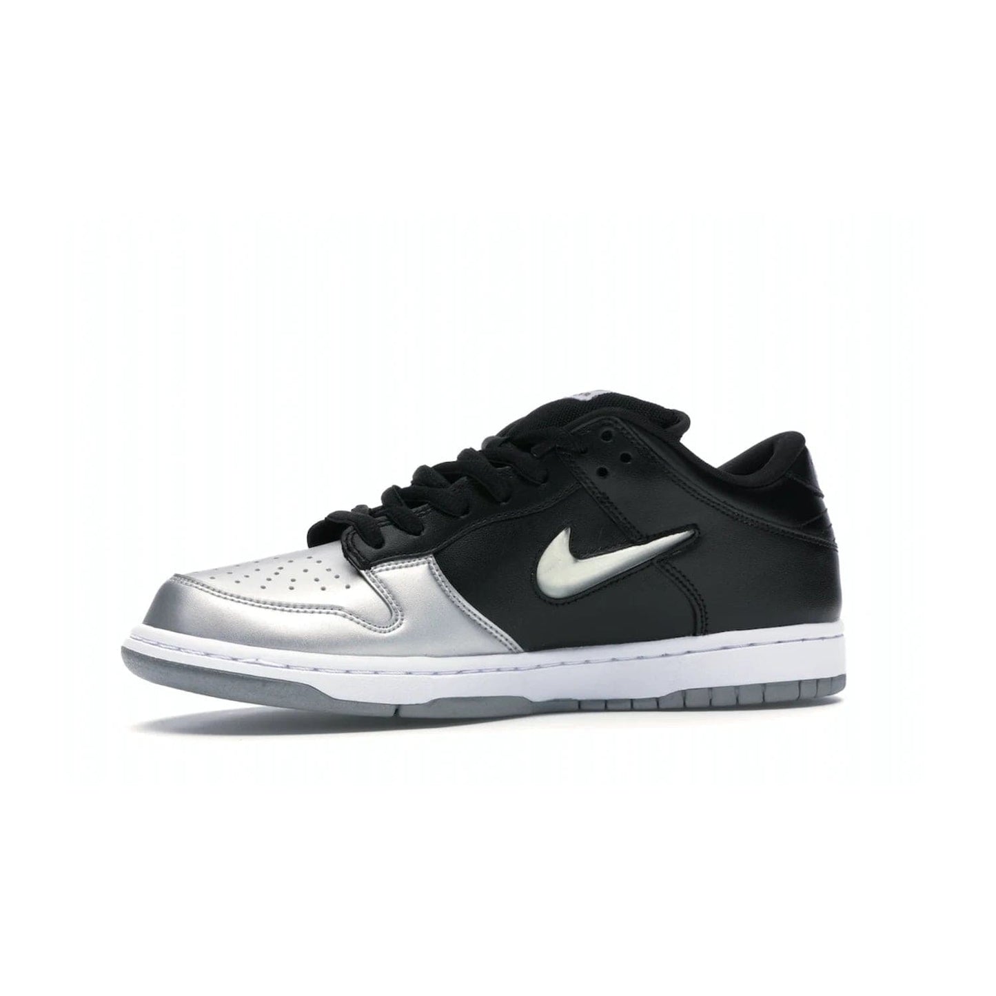 Nike SB Dunk Low Supreme Jewel Swoosh Silver - Image 17 - Only at www.BallersClubKickz.com - This Metallic Silver/Metallic Silver-Black Nike SB Dunk Low Supreme Jewel Swoosh Silver brings a flashy design to the iconic SB Dunk. Released in 2019, this is a must-have for any collection.
