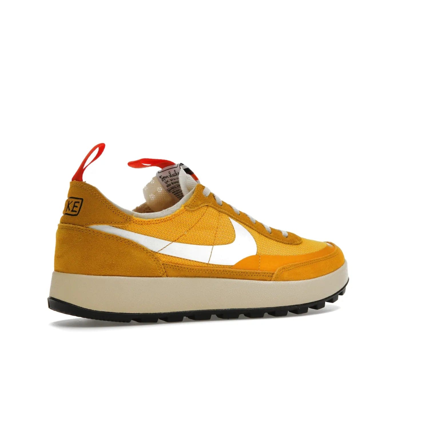 NikeCraft General Purpose Shoe Tom Sachs Archive Dark Sulfur - Image 34 - Only at www.BallersClubKickz.com - Collab between Nike & Tom Sachs. The NikeCraft General Purpose Shoe features dark sulfur mesh upper, suede overlays, contrasting white Swoosh and orange tabs. EVA cushioning & black waffle-traction rubber outsole ensures performance. Stylish & perfect for any occasion, the shoe released September 2, 2022.