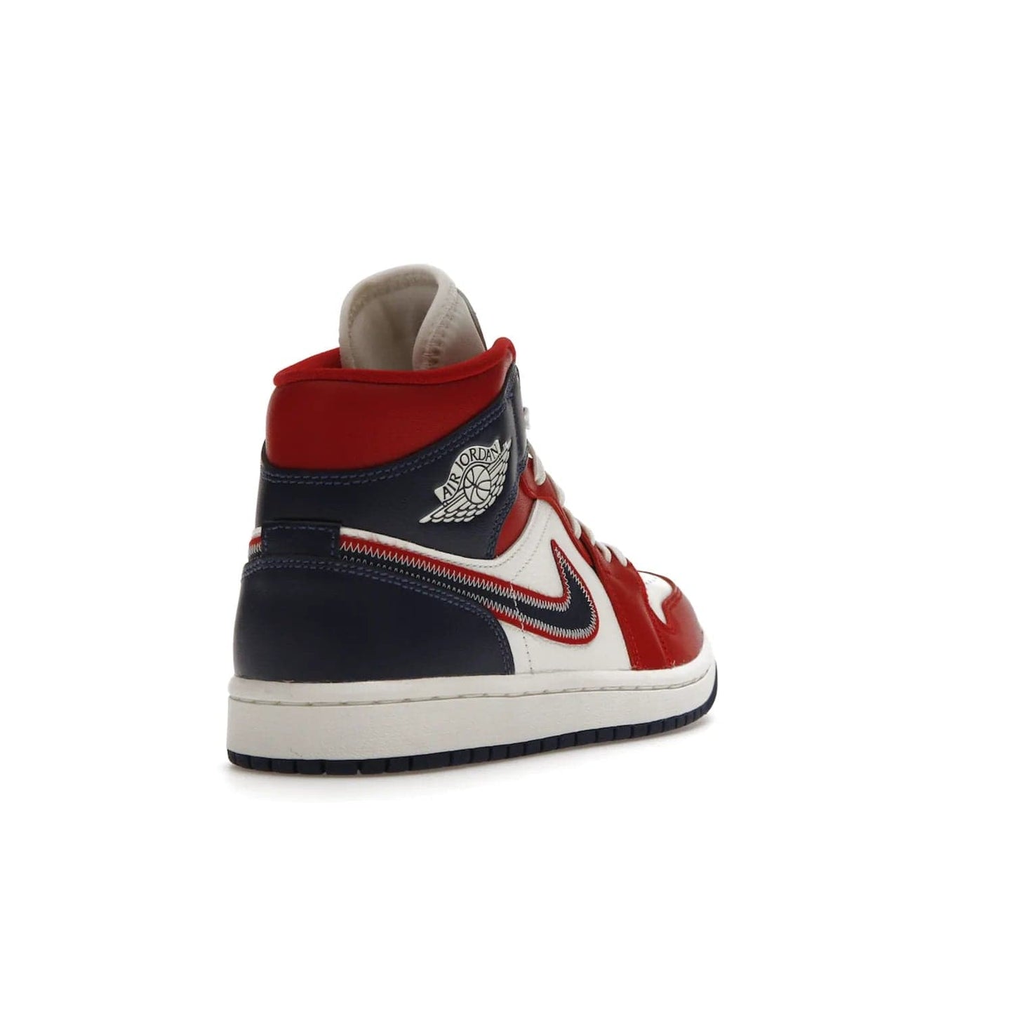 Jordan 1 Mid USA (2022) (Women's) - Image 31 - Only at www.BallersClubKickz.com - A bold mosaic of bright red and navy. Step up your game with the Jordan 1 Mid. Showcase the iconic "Wings" logo, classic Jumpman midsole, and go for the gold!