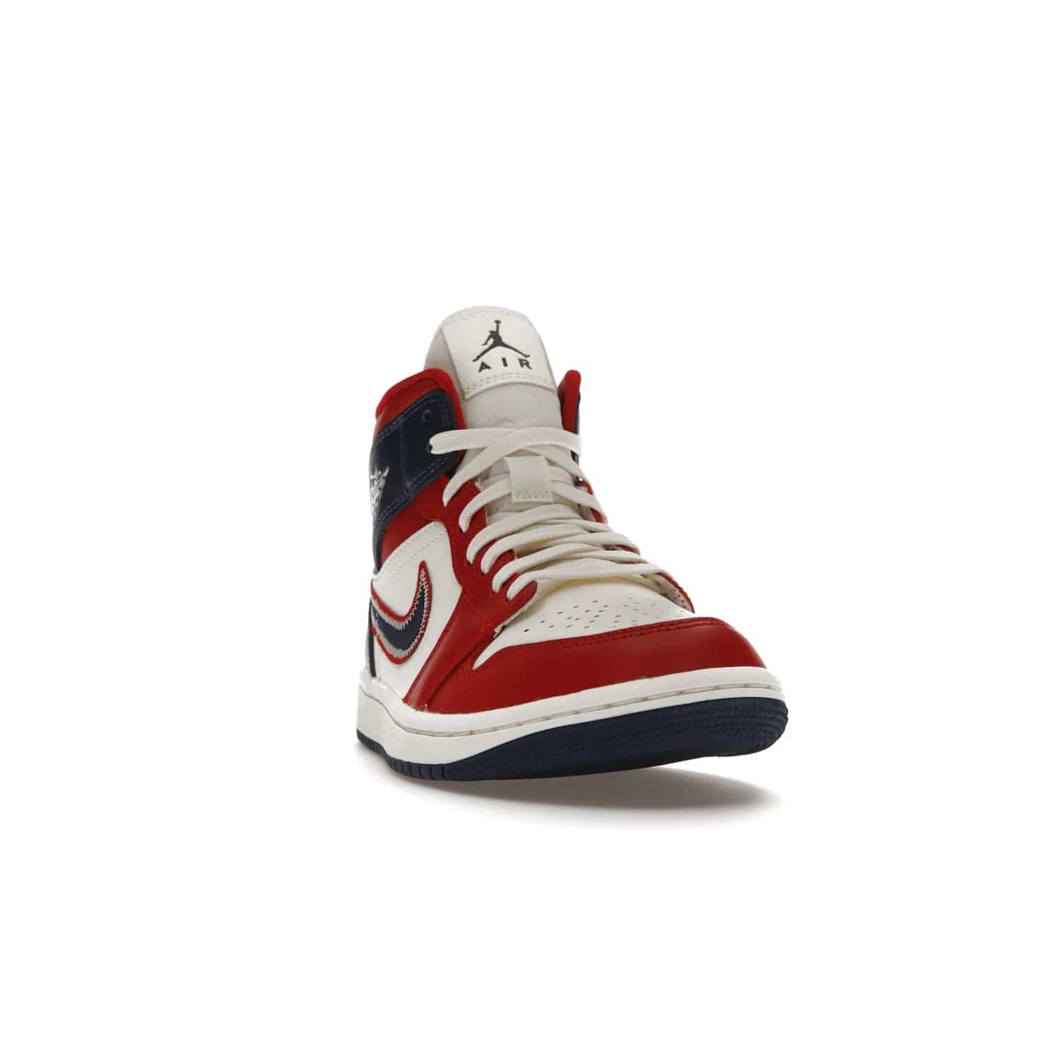 Jordan 1 Mid USA (2022) (Women's) - Image 8 - Only at www.BallersClubKickz.com - A bold mosaic of bright red and navy. Step up your game with the Jordan 1 Mid. Showcase the iconic "Wings" logo, classic Jumpman midsole, and go for the gold!