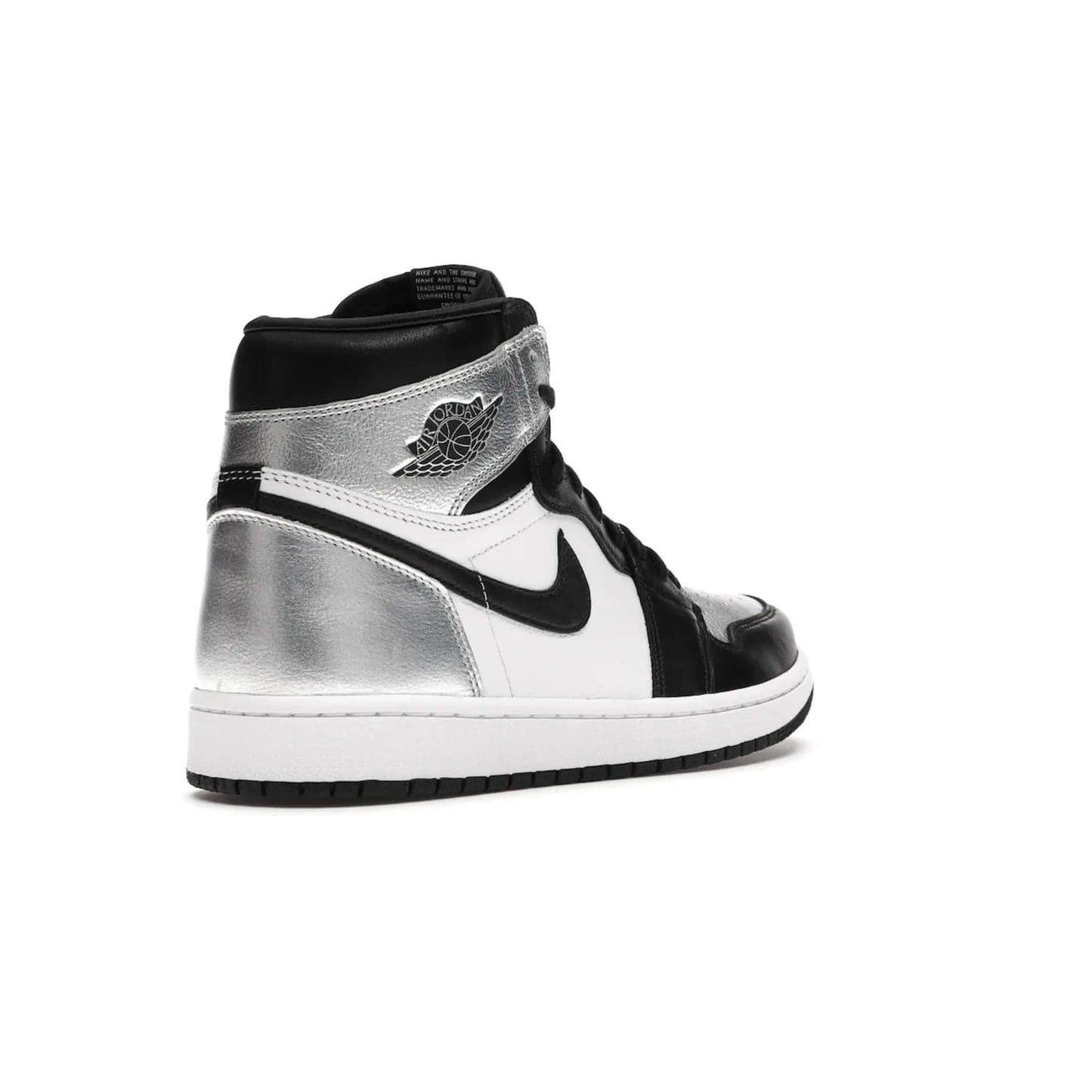 Jordan 1 Retro High Silver Toe (Women's) - Image 32 - Only at www.BallersClubKickz.com - Introducing the Jordan 1 Retro High Silver Toe (Women's): an updated spin on the iconic 'Black Toe' theme. Featuring white & black leather and silver patent leather construction. Nike Air branding, Air Jordan Wings logo, and white/black sole finish give a classic look. The perfect addition to an on-trend streetwear look. Available in classic black & white, this Jordan 1 is an instant classic. Released in February 20