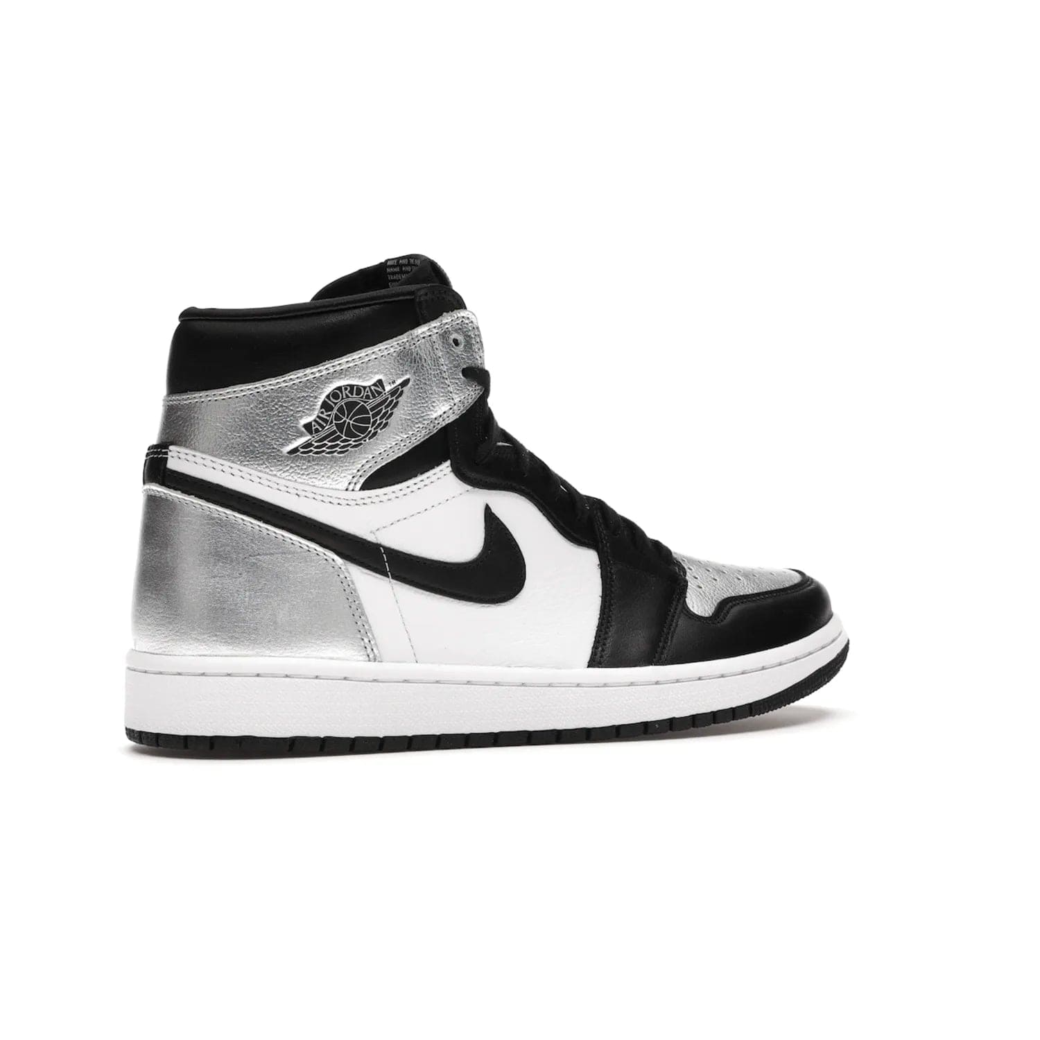 Jordan 1 Retro High Silver Toe (Women's) - Image 34 - Only at www.BallersClubKickz.com - Introducing the Jordan 1 Retro High Silver Toe (Women's): an updated spin on the iconic 'Black Toe' theme. Featuring white & black leather and silver patent leather construction. Nike Air branding, Air Jordan Wings logo, and white/black sole finish give a classic look. The perfect addition to an on-trend streetwear look. Available in classic black & white, this Jordan 1 is an instant classic. Released in February 20