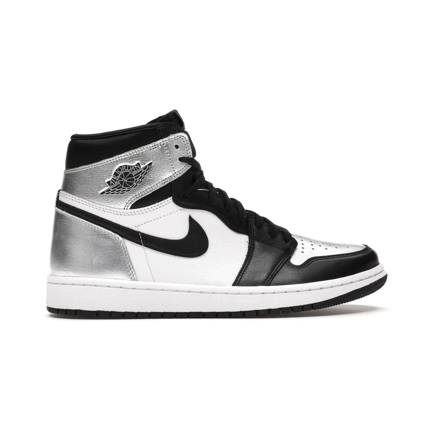 Jordan 1 Retro High Silver Toe (Women's) - Image 36 - Only at www.BallersClubKickz.com - Introducing the Jordan 1 Retro High Silver Toe (Women's): an updated spin on the iconic 'Black Toe' theme. Featuring white & black leather and silver patent leather construction. Nike Air branding, Air Jordan Wings logo, and white/black sole finish give a classic look. The perfect addition to an on-trend streetwear look. Available in classic black & white, this Jordan 1 is an instant classic. Released in February 20