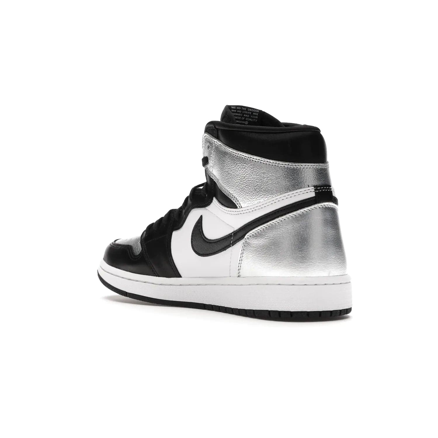 Jordan 1 Retro High Silver Toe (Women's) - Image 24 - Only at www.BallersClubKickz.com - Introducing the Jordan 1 Retro High Silver Toe (Women's): an updated spin on the iconic 'Black Toe' theme. Featuring white & black leather and silver patent leather construction. Nike Air branding, Air Jordan Wings logo, and white/black sole finish give a classic look. The perfect addition to an on-trend streetwear look. Available in classic black & white, this Jordan 1 is an instant classic. Released in February 20