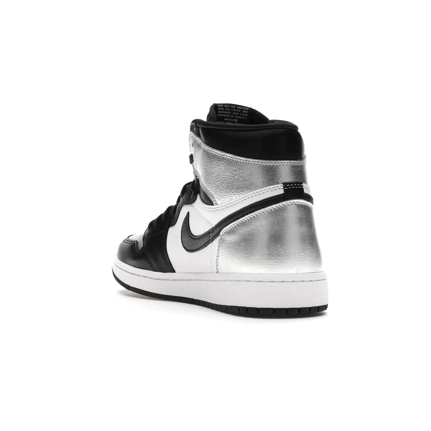 Jordan 1 Retro High Silver Toe (Women's) - Image 25 - Only at www.BallersClubKickz.com - Introducing the Jordan 1 Retro High Silver Toe (Women's): an updated spin on the iconic 'Black Toe' theme. Featuring white & black leather and silver patent leather construction. Nike Air branding, Air Jordan Wings logo, and white/black sole finish give a classic look. The perfect addition to an on-trend streetwear look. Available in classic black & white, this Jordan 1 is an instant classic. Released in February 20