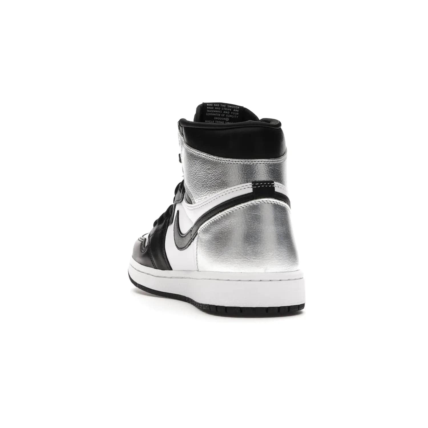 Jordan 1 Retro High Silver Toe (Women's) - Image 26 - Only at www.BallersClubKickz.com - Introducing the Jordan 1 Retro High Silver Toe (Women's): an updated spin on the iconic 'Black Toe' theme. Featuring white & black leather and silver patent leather construction. Nike Air branding, Air Jordan Wings logo, and white/black sole finish give a classic look. The perfect addition to an on-trend streetwear look. Available in classic black & white, this Jordan 1 is an instant classic. Released in February 20