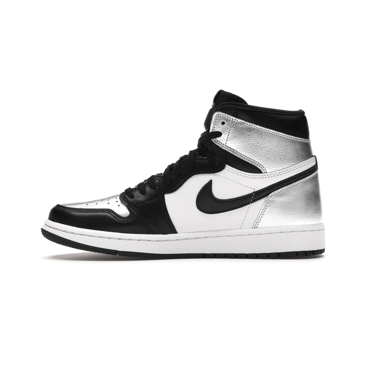 Jordan 1 Retro High Silver Toe (Women's) - Image 19 - Only at www.BallersClubKickz.com - Introducing the Jordan 1 Retro High Silver Toe (Women's): an updated spin on the iconic 'Black Toe' theme. Featuring white & black leather and silver patent leather construction. Nike Air branding, Air Jordan Wings logo, and white/black sole finish give a classic look. The perfect addition to an on-trend streetwear look. Available in classic black & white, this Jordan 1 is an instant classic. Released in February 20