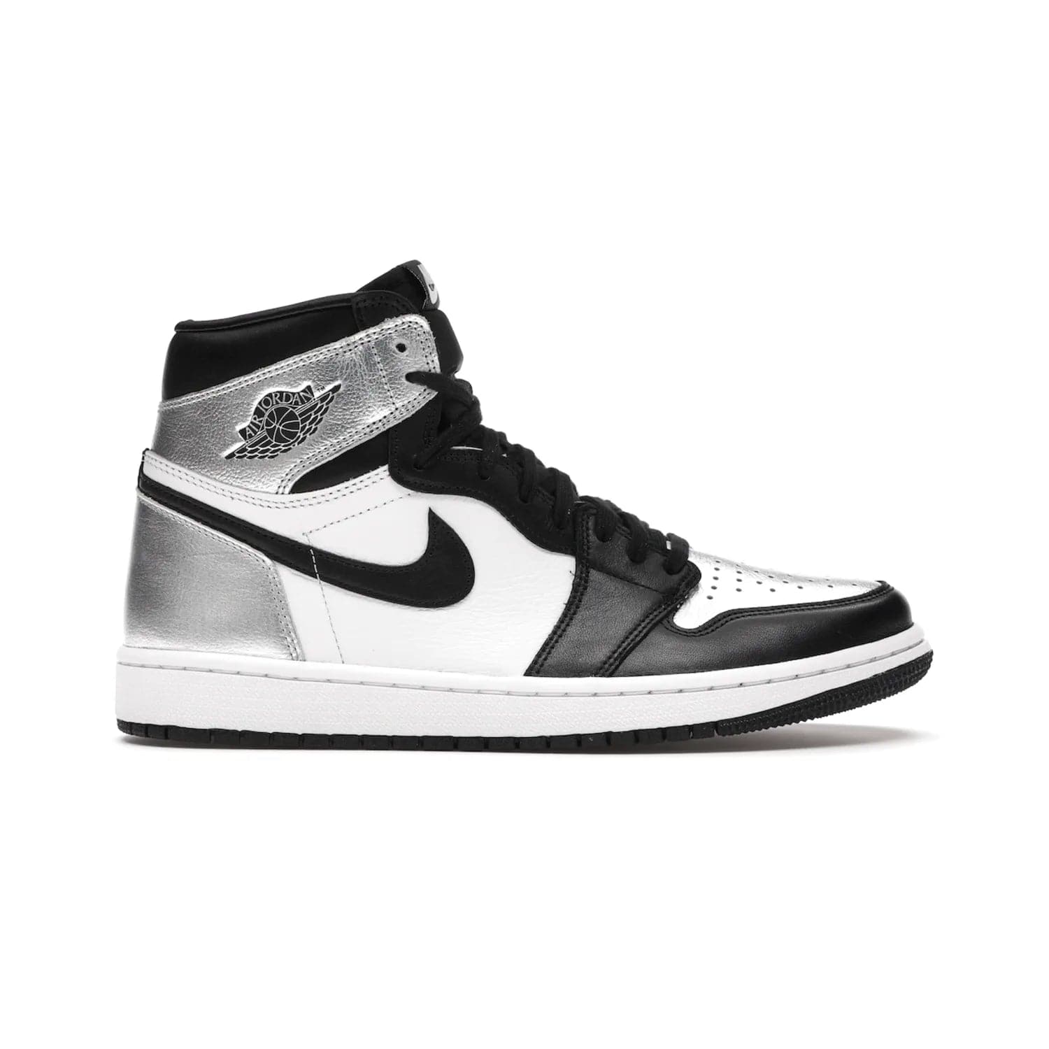 Jordan 1 Retro High Silver Toe (Women's) - Image 1 - Only at www.BallersClubKickz.com - Introducing the Jordan 1 Retro High Silver Toe (Women's): an updated spin on the iconic 'Black Toe' theme. Featuring white & black leather and silver patent leather construction. Nike Air branding, Air Jordan Wings logo, and white/black sole finish give a classic look. The perfect addition to an on-trend streetwear look. Available in classic black & white, this Jordan 1 is an instant classic. Released in February 202