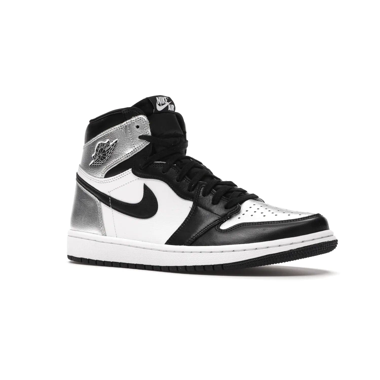 Jordan 1 Retro High Silver Toe (Women's) - Image 4 - Only at www.BallersClubKickz.com - Introducing the Jordan 1 Retro High Silver Toe (Women's): an updated spin on the iconic 'Black Toe' theme. Featuring white & black leather and silver patent leather construction. Nike Air branding, Air Jordan Wings logo, and white/black sole finish give a classic look. The perfect addition to an on-trend streetwear look. Available in classic black & white, this Jordan 1 is an instant classic. Released in February 202