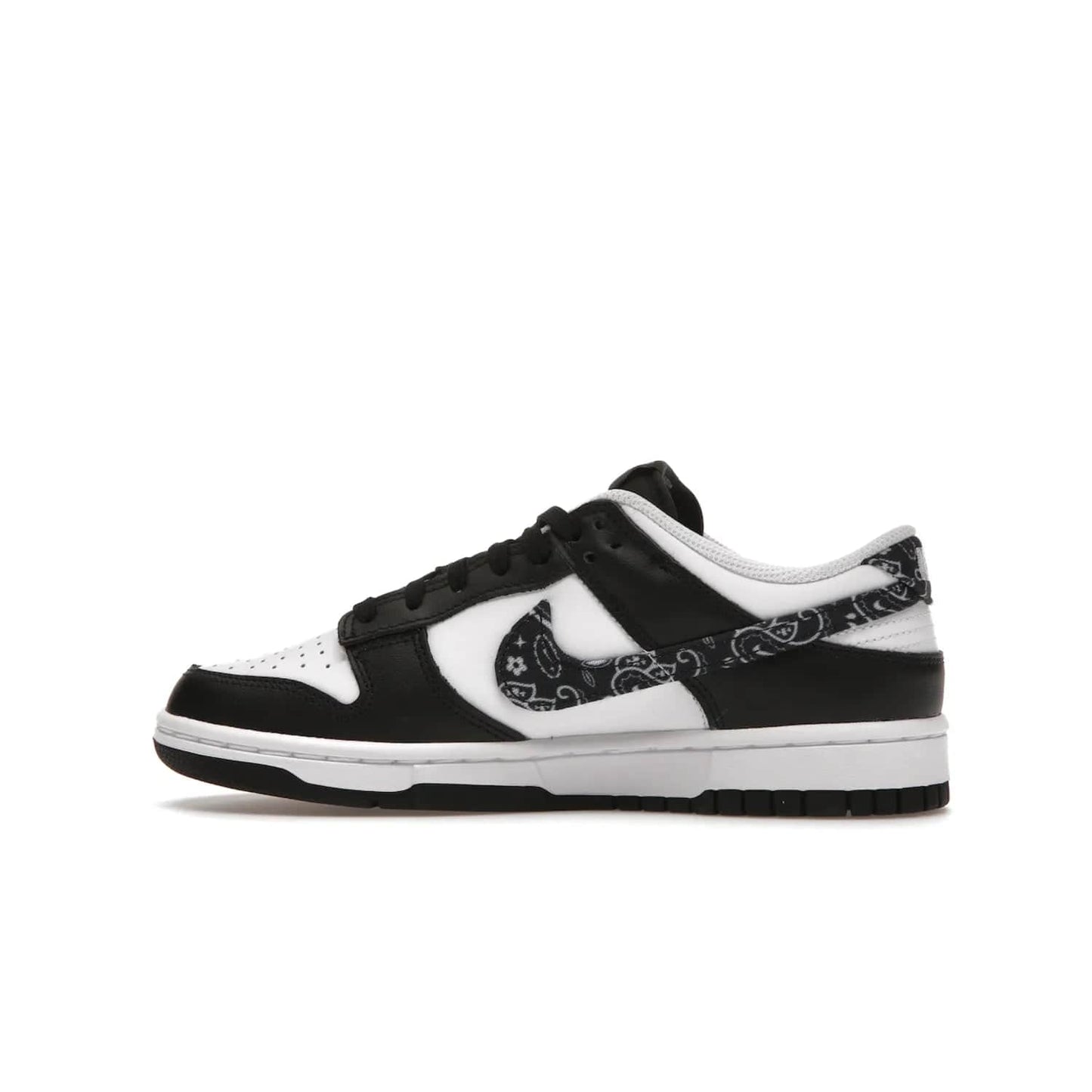 Nike Dunk Low Essential Paisley Pack Black (Women's) - Image 20 - Only at www.BallersClubKickz.com - Make a statement with the all-black Nike Dunk Low Essential Paisley Pack Black (Women's) featuring white leather overlays, a stunning paisley bandana print, and a white midsole for comfort and optimal grip on any surface.