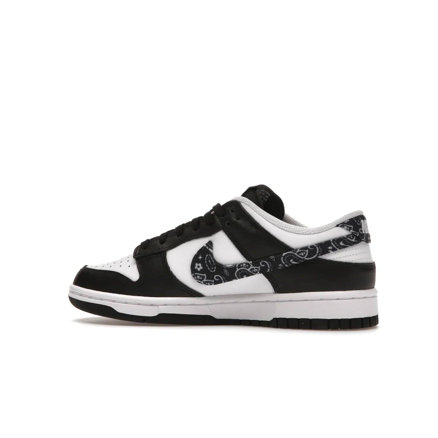 Nike Dunk Low Essential Paisley Pack Black (Women's) - Image 21 - Only at www.BallersClubKickz.com - Make a statement with the all-black Nike Dunk Low Essential Paisley Pack Black (Women's) featuring white leather overlays, a stunning paisley bandana print, and a white midsole for comfort and optimal grip on any surface.